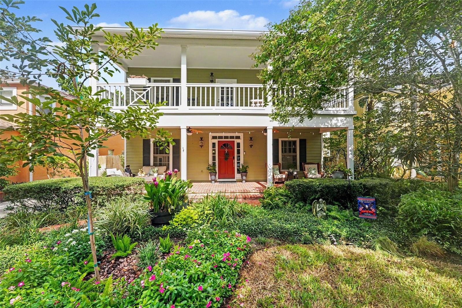 Nestled in the highly sought-after Ballast Point neighborhood, this beautifully maintained 3-bedroom, 2.5-bath home blends timeless character with thoughtful updates and exceptional outdoor living. From the welcoming front porch to the spacious interior, every space is designed for comfortable everyday living and effortless entertaining. Step inside to a grand foyer that opens to formal living and dining rooms before leading into the inviting family room, complete with a wood-burning fireplace, custom built-in bookcases, and abundant natural light. Just beyond, the sunroom overlooks a private, courtyard-inspired backyard oasis featuring lush landscaping, a brick patio, and plenty of space to relax or entertain. The updated kitchen offers quartz countertops (2022), stainless steel appliances, abundant cabinetry, generous prep space, and a sunny breakfast area. An updated half bath (2021) completes the first floor. Upstairs, you'll find all three bedrooms along with access to an expansive second-floor balcony—an ideal spot to enjoy your morning coffee or unwind in the evening. The impressive primary retreat features elegant double-door entry, an oversized sitting area perfect for a home office or reading nook, dual custom walk-in closets, and a beautifully updated ensuite bath with dual marble vanities, a soaking Jacuzzi tub, separate walk-in shower, and wood-look tile flooring (2019). Upstairs carpeting was replaced in 2019, while the hardwood floors throughout the home were professionally refinished in 2021. Additional updates provide peace of mind, including a new roof (2025), two HVAC systems (2020 & 2025), water heater (approximately 2 years old), exterior paint (2018), backyard fence (2022), and detached two-car garage. The home experienced no flooding or hurricane damage during recent storms. Perfectly positioned just minutes from Ballast Point Park, Bayshore Boulevard, the Tampa Yacht & Country Club, waterfront recreation, shopping, dining, and everything South Tampa has to offer, this move-in ready home offers the ideal combination of location, charm, and modern updates. Click the Virtual Tour to experience the 3D walkthrough and schedule your private showing today. Discounted rate options and no lender-fee future refinancing may be available for qualified buyers of this home.