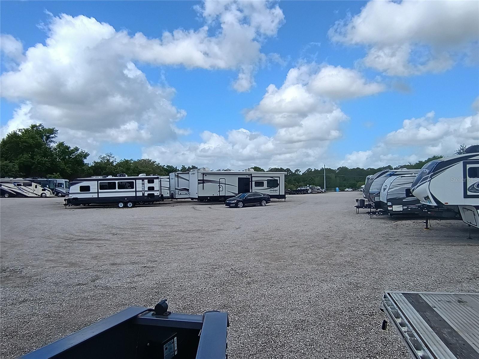 Industrial Storage Yard - 6.17 acres in size along the I-4 corridor less than a mile to the I-4 on/off exit ramps.  This property is currently leased on a 5 year lease to Manheim Auto Auction paying $5,743/month -- way under the market value for such property.  Buyer must respect the remaining lease with current tenant.  Property is fenced, covered in stone, and currently being used for a storage yard.   Rare and desirable industrial zoning.   Logistically perfectly located in the center of Florida!  Access via Tomkow Rd.