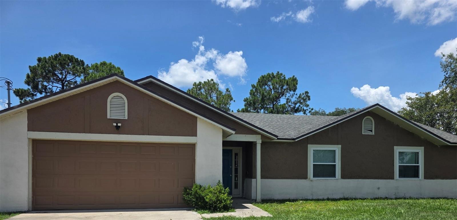 **Lakefront Living at Its Finest!**

Welcome to your own private lakeside retreat! Nestled on a peaceful  lake in the Deltona Lakes community, this beautifully maintained **4-bedroom, 2-bathroom** home offers **1,967 square feet** of comfortable living space on an expansive **half-acre lot**.

Wake up each morning to breathtaking water views and enjoy the tranquility of nature from nearly every room. Whether you're sipping your morning coffee, entertaining guests, or simply unwinding after a long day, the serene lakefront setting creates the perfect backdrop for everyday living.

The updated kitchen is designed to impress, featuring **granite countertops** and **stainless steel appliances*. 
The thoughtfully designed split-bedroom floor plan provides both privacy and functionality for family and guests.

This home has been lovingly cared for and offers valuable updates for added peace of mind, including:

* **New roof (2020)**
* **Stainless steel kitchen appliances (2020)**
* **Interior and exterior paint (2021)**
* **New windows (2025**
* **New privacy fence (2023)**
* **Storage shed (within the last 3 years)**
* **Patio slab (within the last 3 years)**

The oversized lot provides plenty of room for outdoor entertaining, gardening, or storing your recreational toys while taking full advantage of the beautiful waterfront setting.

Conveniently located to schools, shopping, dining, and major roadways, you'll enjoy the perfect balance of peaceful lakefront living and everyday convenience.

**Don't miss this rare opportunity to own a piece of lakefront paradise. Schedule your private showing today and experience the beauty and serenity of this exceptional home!**