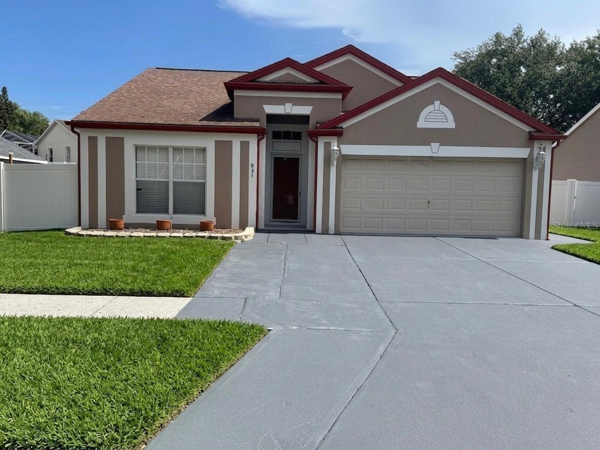 Well-maintained 3-bedroom, 2-bathroom home located in the desirable Tarpon Springs area. This property features a bright, open floor plan with wood flooring and abundant natural light throughout. The spacious living and dining areas offering comfortable everyday living and functional space for hosting. Large sliding glass doors lead to a covered lanai and an enclosed sunroom, providing additional living space and a relaxing area to enjoy Florida’s climate.

The primary suite includes ample room, generous closet storage, and an ensuite bathroom. Two additional bedrooms offers flexibility for guests, family, or a home office. The home also includes a well-appointed kitchen, indoor laundry area, and a private backyard suitable for outdoor use.

Conveniently located near the historic Sponge Docks, Gulf beaches, parks, shopping, and dining. This property offers a blend of comfort and accessibility. All measurements are approximate and should be verified by the tenant. Some photos may include virtual staging or modifications for marketing purposes.