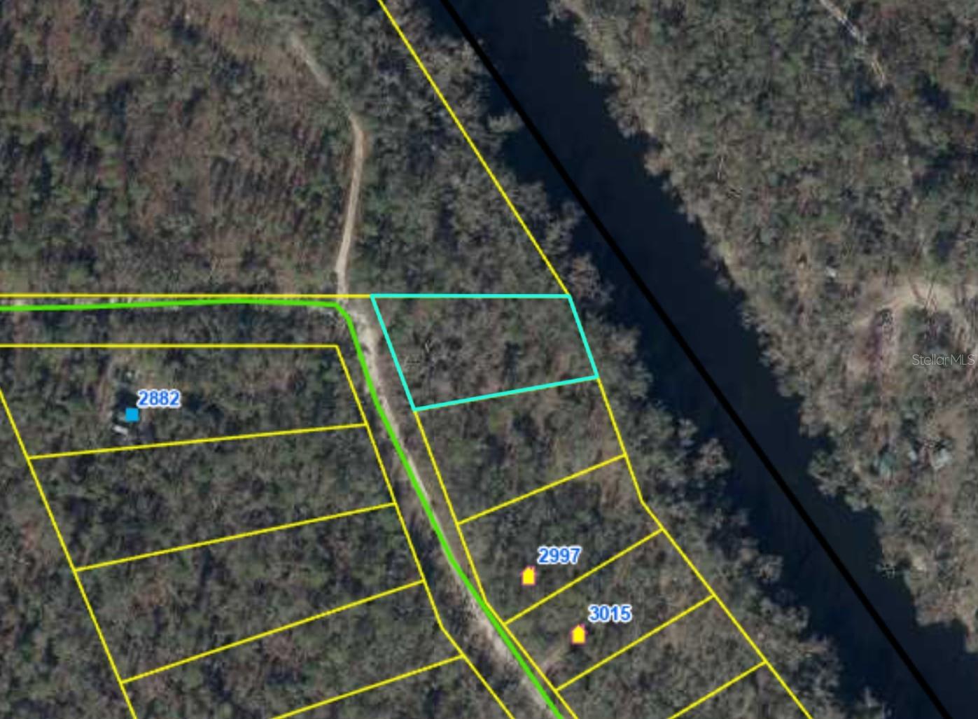 Rare Riverfront Opportunity in Madison County! Discover your own slice of North Florida paradise with this 0.618-acre vacant corner lot in the peaceful Edgewater Subdivision, directly backing onto the scenic Withlacoochee River. Enjoy private river access for kayaking, fishing, or simply soaking in the serene natural beauty of cypress-lined banks and abundant wildlife.

This wooded lot offers a perfect canvas for your dream home or recreational getaway, with no structures currently in place and a desirable corner position for easy access. Located on NE Chervil Dr in charming Lee, FL, it’s just minutes away from the world-famous Madison Blue Spring State Park—voted one of the top swimming holes in the country! Dive into crystal-clear waters, explore the first-magnitude spring, or enjoy picnicking and paddling in this stunning natural oasis.

Ideal for nature lovers seeking tranquility away from the hustle, yet conveniently close to outdoor adventures. Parcel ID: 08-1N-11-6181-0ED-001. Don’t miss this chance to own riverfront property in one of Florida’s hidden gems!