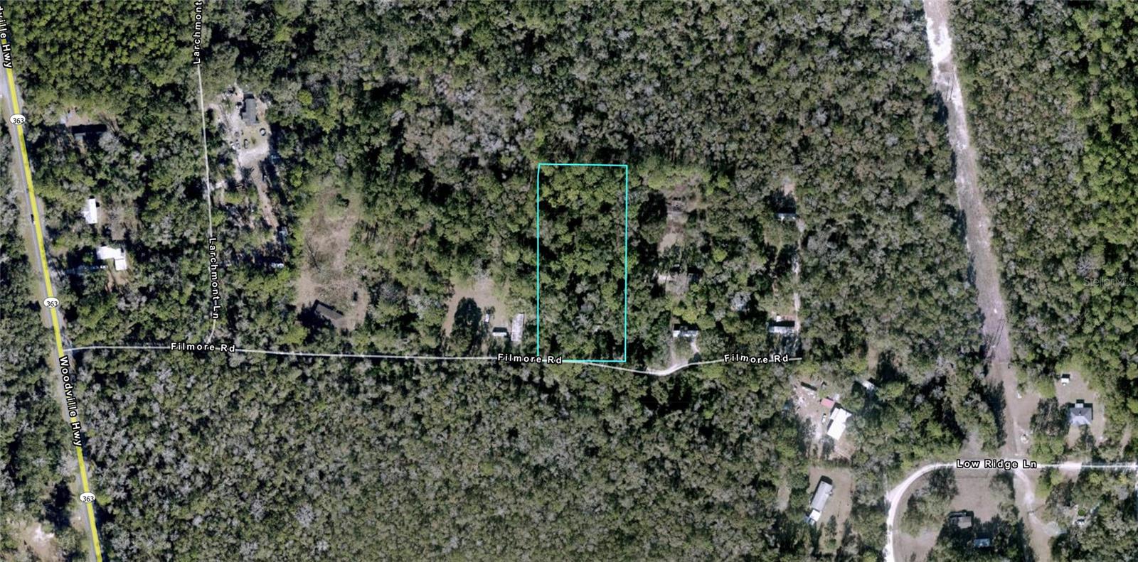 Has an old home/mobile on the property that needs to be torn down. THIS MAY SAVE YOU TONS OF $$$ on development costs potentially, on things like:  installing culvert/driveway, land clearing, well/septic, electric pole nearby, impact fees that are only paid to the county the first time a property is developed from raw land. NO FLOOD ZONE to worry about. Just a few houses over from Woodville Highway. Current owner is an investor that does not know much about the property other than what the previous owner stated. Buyer needs to confirm all improvements and condition of the property, sold as is with no guarantees. Out in the peace and quiet with 2 acres, yet still very close to town. Priced to sell quickly, well below any other 2 acre lot available, hurry!