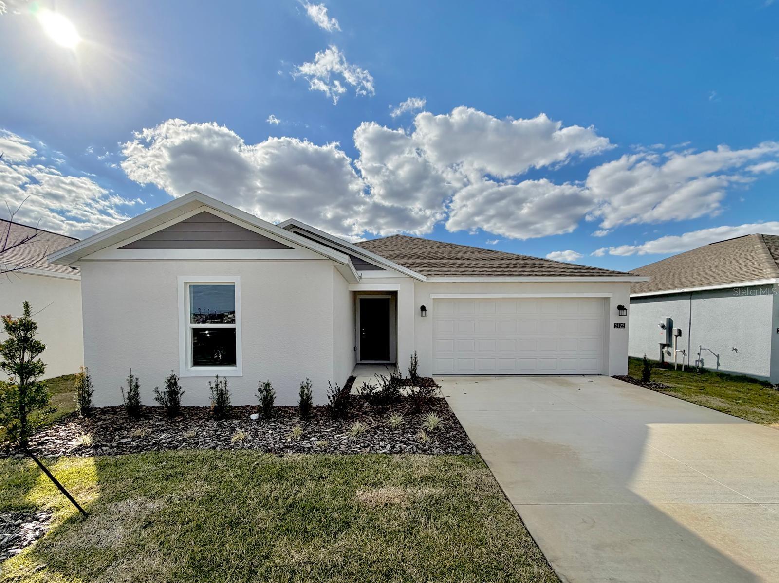 Beautiful brand-new 4-bedroom, 2-bathroom home located in a great area of Winter Haven. The property features a charming front porch, perfect for relaxing. Inside, the home offers a spacious open-concept living room seamlessly connected to the dining area and kitchen, creating a modern and functional layout. Sliding glass doors provide access to a large outdoor area, ideal for entertaining and everyday enjoyment. The kitchen is fully equipped with appliances, wood cabinets, and a breakfast bar for quick meals. The primary suite includes generous closet space, offering comfort and convenience. The home is located in a planned community with newly built single-family homes and offers excellent amenities such as a community pool, playground, sidewalks, and a beautiful natural creek, providing a peaceful and family-friendly environment. Excellent location, close to: Schools and supermarkets Restaurants and local shopping Quick access to US-27 and main roads Just minutes from LEGOLAND® Florida Resort Easy access to downtown Winter Haven and nearby cities Don’t miss this opportunity to rent a brand-new home with comfort, amenities, and a prime location. Schedule your showing today!