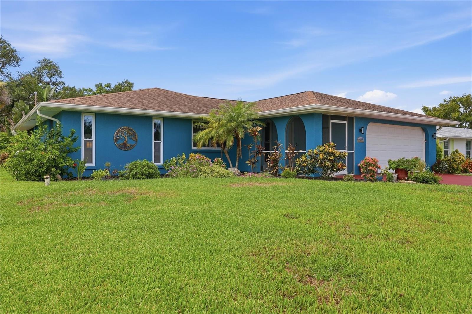 Waterfront Pool Home on Over Half an Acre with Gulf Access, No HOA & Room to Expand!
Rare Englewood waterfront pool home with Gulf access, no HOA, and more than half an acre in one of the area's most desirable Old Florida neighborhoods. This meticulously maintained, move-in-ready 2-bedroom, 2-bath home is situated along scenic Gottfried Creek and offers boating access to Lemon Bay, the Intracoastal Waterway, and the Gulf via two bridges. The oversized homesite also offers the potential to build a second residence on the additional lot, creating an exceptional opportunity for multigenerational living, future expansion, or investment.
Lovingly cared for with no storm damage, this exceptional home provides buyers with confidence and peace of mind.
Inside, the inviting split-bedroom floor plan is centered around a spacious great room where expansive sliding glass doors showcase beautiful views of the heated pool, lush tropical landscaping, and a peaceful oak hammock filled with native birds and Florida wildlife. The desirable north-facing rear exposure allows you to enjoy tranquil sunrises through the tropical landscape while ending the day with spectacular Florida sunsets.
Designed for both everyday living and entertaining, the updated kitchen features granite countertops, soft-close cabinetry, stainless steel appliances, modern lighting, and a convenient pass-through window to the Florida room.
The spacious primary suite offers a walk-in closet, private ensuite bath, and direct access to the screened lanai, creating the perfect private retreat.
Recent improvements include:
Impact-resistant windows and sliding glass doors
Fresh exterior paint (2024)
Gutters (2022)
Well-fed irrigation system (2023)
Fresh sod and professional landscaping
Adjustable LED lighting throughout
Perfectly positioned on a quiet cul-de-sac, the home is just minutes from historic Dearborn Street, where you'll enjoy boutique shopping, locally owned restaurants, art galleries, farmers markets, festivals, and year-round community events. The future Keyway Road extension will provide even more convenient access to Wellen Park, home of CoolToday Park (Atlanta Braves Spring Training), a vibrant downtown district featuring waterfront dining, live entertainment, shopping, and seasonal events.
Just four miles from Englewood Beach and Manasota Key, you'll enjoy miles of Gulf beaches, boating, fishing, paddleboarding, kayaking, shelling, and spectacular Florida sunsets.
As an added bonus, this property is eligible for membership in the Englewood Gardens Beach Club, providing private beach access, clubhouse amenities, and boat docks.
Whether you're searching for a waterfront primary residence, seasonal retreat, vacation rental, investment property, or a home with room to expand, this exceptional property offers endless possibilities in one of Southwest Florida's fastest-growing coastal communities.