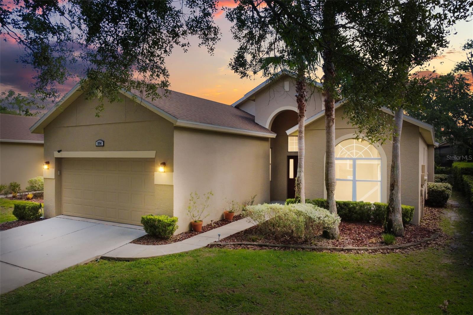 Welcome to 1154 Kersfield Circle, a meticulously maintained 3-bedroom, 2-bathroom home tucked inside the sought-after, gated Keenwicke enclave of Heathrow. Set on a quiet, tree-lined street, this 1,783-square-foot home blends comfortable living with thoughtful, move-in-ready updates. Step inside to find fresh tile flooring (2023) and lovely wood floors in the great room. The kitchen was refreshed in 2023 with new stainless steel appliances, ready for everyday cooking or entertaining. The spacious primary suite offers a true retreat, complete with a walk-in closet, a corner glass-enclosed shower, a separate soaking garden tub, and an updated dual-sink vanity. The secondary bathroom also received a stylish vanity upgrade, with crisp marble-look countertops and modern fixtures throughout.
Out back, unwind on the covered, screened lanai overlooking a fenced yard with mature landscaping and serene tree views beyond — the perfect spot for morning coffee or evening relaxation in true Florida fashion.
Major systems have been well cared for, with a newer roof (2019), Carrier AC unit (2014, professionally cleaned and serviced in 2026), offering peace of mind for years to come.
Located in Heathrow, one of Seminole County's premier gated communities, residents enjoy access to top-rated schools, beautifully maintained common areas, and a quiet, established neighborhood feel — all just minutes from I-4, the 417, shopping, dining, and major employment corridors.
This is a rare opportunity to own in Keenwicke. Contact me today to schedule your private showing! Pick your colors... seller will offer credit or replace the bedroom carpet before close with an acceptable offer.