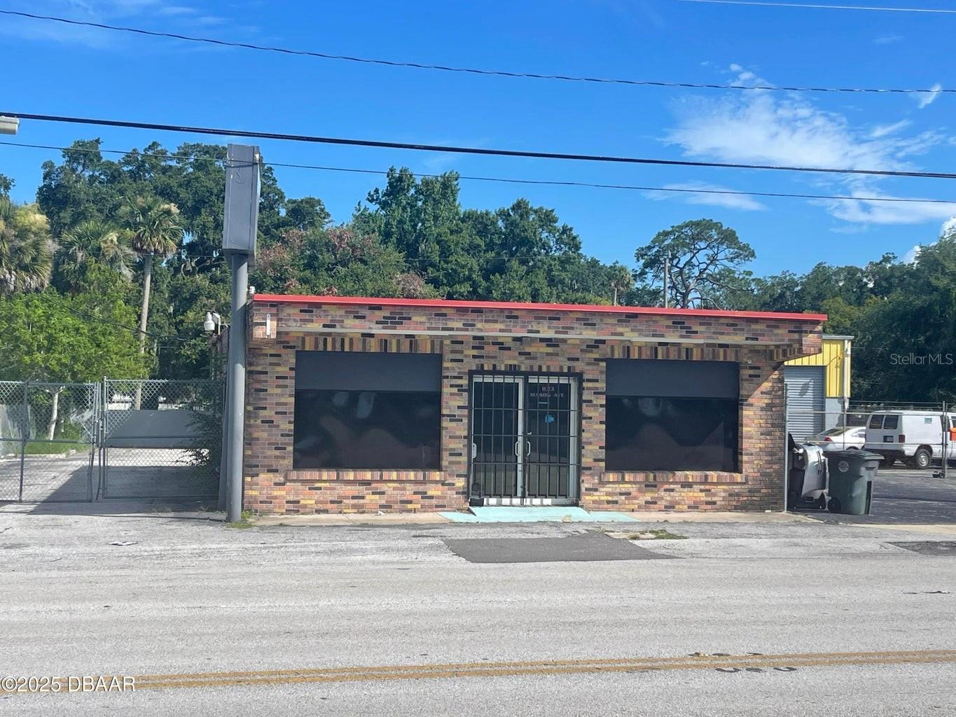 Free Standing Block Building with Open Floor Plan. 1725 S.F. Located on busy Mason Ave (18,300 AADT) Office, Backroom, Restroom & New AC. BA-Zoning allows for Many Uses. Adult Bookstore, Animal Grooming/Vet, Motor Vehicle Sales & Service, Office, Package Store, Martial Arts Use and so much more. Please see the attachment in the documents.