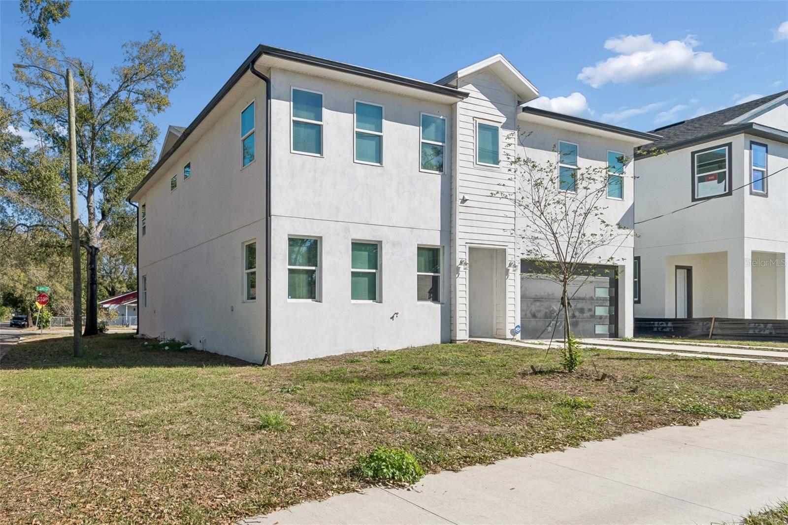 Invest in this modern duplex in Ybor City, just 2 miles from downtown. Each unit offers 3 bedrooms and 3 baths spread across 1,666 sq ft. The master bedroom is conveniently located on the first floor, alongside the kitchen, while two additional bedrooms are upstairs. With each unit commanding rent of $2,600 or higher, this property promises steady rental income and Airbnb potential.
Seller financing options available, making this an even more attractive opportunity for investors looking for flexible purchasing terms.
Enjoy the perks of single-family living with exclusive fenced-in yards and no HOA constraints, ensuring privacy and autonomy. Inside, you'll find an open-concept layout perfect for entertaining, with elegant kitchens featuring light cabinets, quartz countertops, and spacious walk-in pantries. The family rooms boast stunning walls of windows, flooding the space with natural light.
The oversized owner's retreat offers comfort and luxury, featuring en-suite bathrooms with walk-in showers, double vanities, and generously sized walk-in closets. Impact glass windows and doors, meticulously painted garage floors, and thoughtful touches like shower niches add functionality and charm.
This property comes with a one-year warranty, underscoring its quality and providing peace of mind to the new owner. Seize this opportunity to own a property that harmonizes efficiency, beauty, and comfort—a true investment in a prime location.