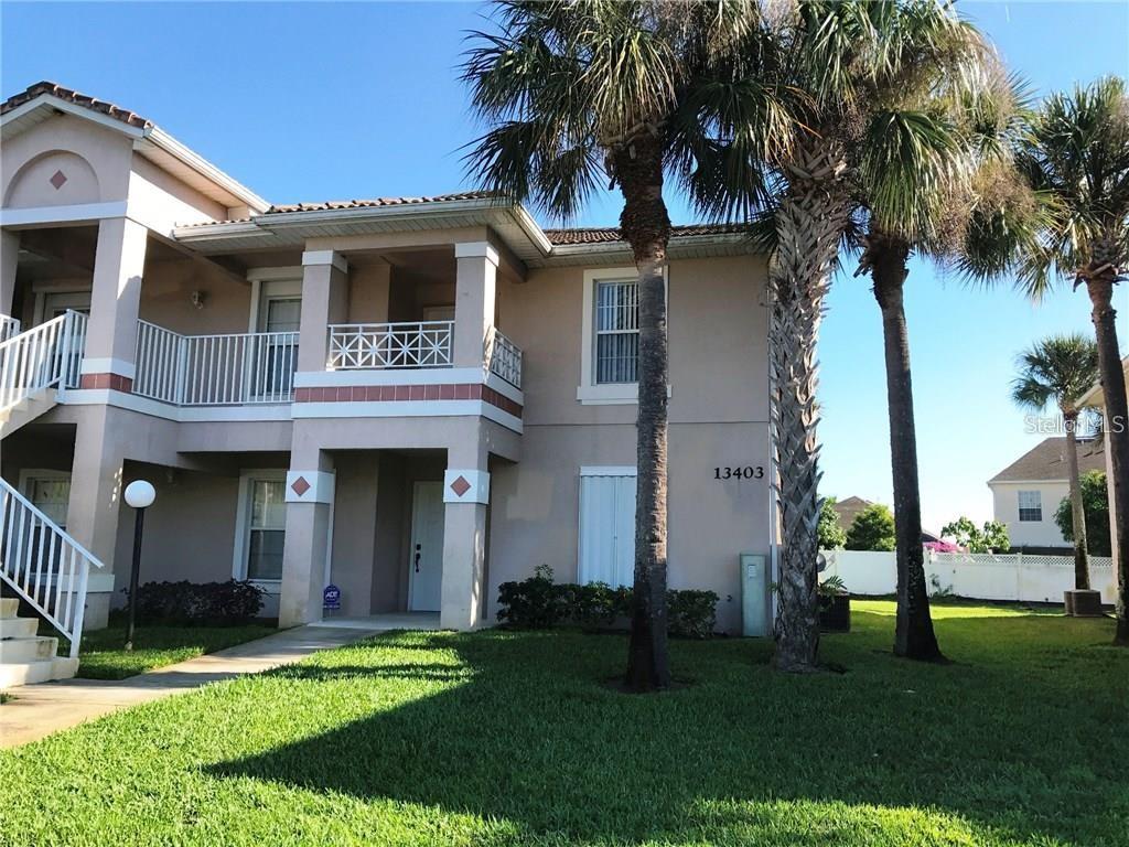 Spacious 3-Bedroom Condo in Gated Fairway Glen – Prime Orlando Location! This well-maintained 3-bedroom, 2-bath unit features durable tile flooring throughout, a functional kitchen with wood cabinetry, a pantry, and a pass-through window to the open dining/living area, perfect for entertaining. The primary suite includes a walk-in closet and a private en-suite bathroom for added comfort. Nestled in the gated community of Fairway Glen at Meadow Woods, this home offers unbeatable convenience—just minutes from I-4, the Florida Turnpike, Osceola Parkway, and 417. Enjoy quick access to SeaWorld, Universal Studios, International Drive, Lake Nona's Medical City, and Orlando International Airport. Step outside to your covered and screened balcony, ideal for relaxing after a busy day. Schedule your showing today and experience low-maintenance living in a high-demand location!
