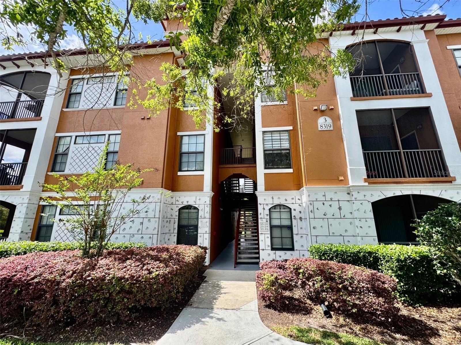Highly desirable third-floor unit in the luxurious Serenata Condominiums. This light-filled home features an open-concept layout with vaulted ceilings, oversized hurricane-impact windows and sliders that lead to your own private screened patio. Recent upgrades include: 2023 HVAC system with UV light, beautiful kitchen featuring quartz counter tops/subway tile backsplash and stainless-steel appliances, new lighting and fans, living/dining room area offers crown molding and built in shelving which provides both modern comfort and peace of mind. The spacious primary bedroom includes a large walk-in California style closet and beautifully tiled bathroom with a quartz vanity. The oversized storage closet on the balcony is an added bonus for everyday convenience. Serenata is a maintenance-free, gated community known for its exceptional amenities, including a resort-style pool, 24-hour fitness center, lighted tennis court, game room, library, clubhouse Wi-Fi, and valet trash service. The grounds are beautifully and meticulously maintained with lush, mature landscaping throughout. Ideally located just minutes from everyday essentials like Publix, CVS, Starbucks, and Panera Bread, as well as the UTC Mall and Sarasota Airport (only 5 minutes away). Downtown Sarasota and St. Armands are just a short 10–15 minute drive.