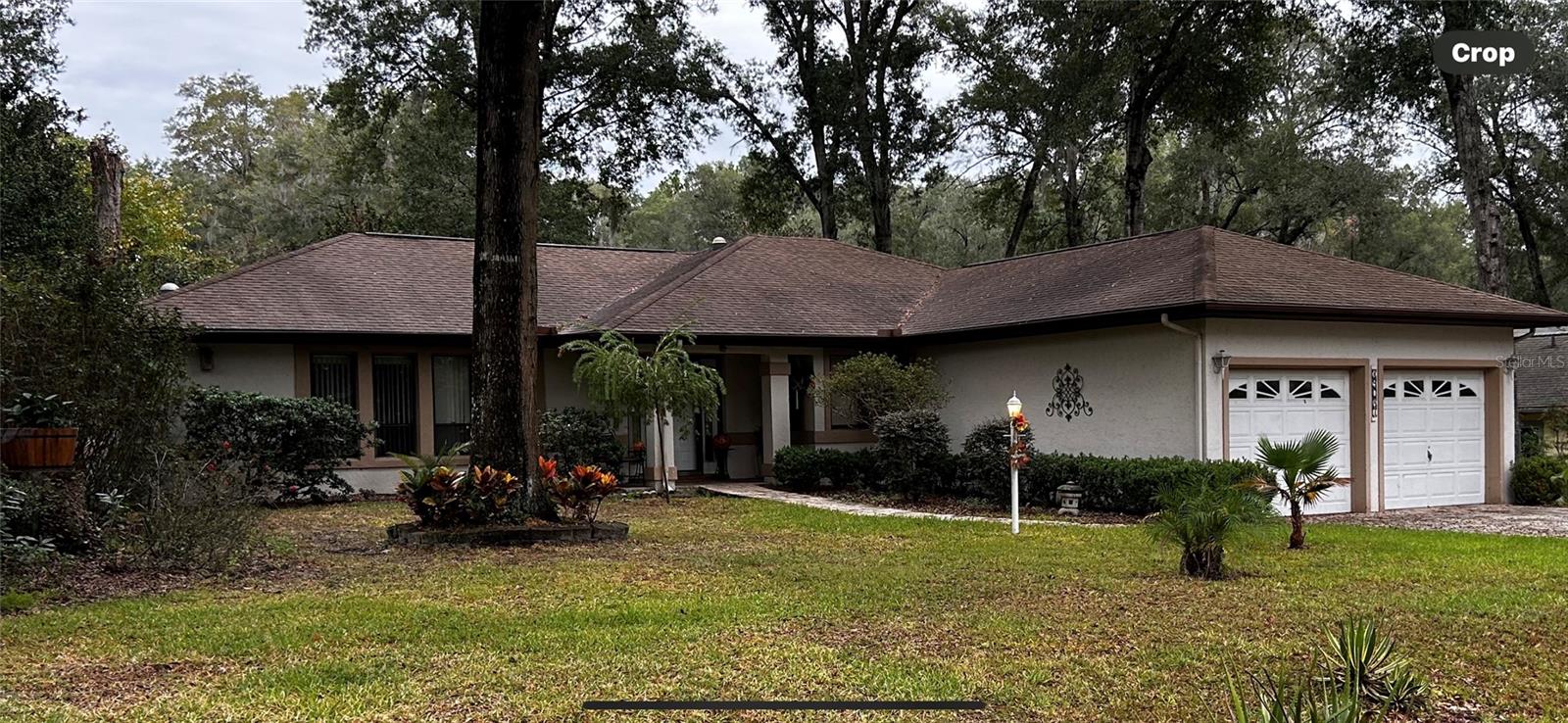This split-plan 3-bedroom, 2-bathroom home in Rainbow Springs Country Club seems to offer a range of attractive features:

Layout: Split-plan design offering privacy between the bedrooms.
Garage: A 2-door, 2-car garage providing ample parking space.
Exterior: Paved walkway around the house, making the property easily accessible.
Accessibility: Permanent ladder to the attic for convenient storage access.
Water Filtration System: Included, ensuring clean and safe water.
Florida Room: Featuring a hot tub, providing a relaxing space to unwind.
Amenities: Clubhouse, community pool, and tennis courts for recreational activities.
Private Beach and River Access for residents and their guests: Access to Rainbow River adds a unique and desirable feature for nature lovers and water enthusiast.
The property is being priced for highly motivated sellers that might indicate a favorable opportunity for potential buyers.
