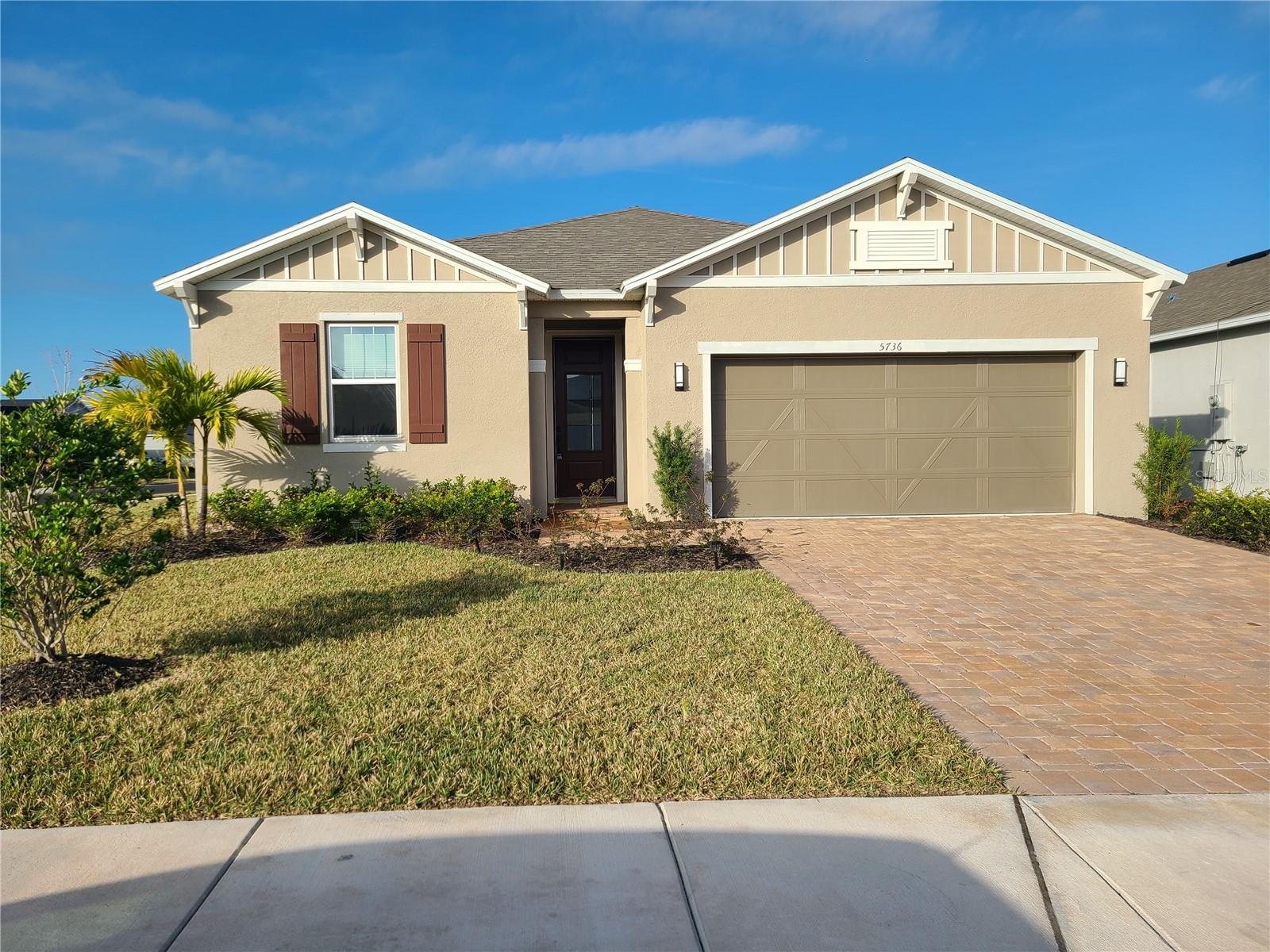 Welcome to 5736 143rd Ct E in the highly desirable Gated Avaunce community of Lakewood Ranch! Built in 2022, this beautifully maintained corner lot 4-bedroom, 2-bath residence offers over 2,000 square feet of thoughtfully designed living space on a premium corner lot. Featuring an open-concept floor plan, this home seamlessly blends comfort and style with granite countertops, stainless steel appliances, 42-inch cabinetry, and spacious living and dining areas perfect for entertaining. The private owner's suite boasts a custom California-style walk-in closet, while the split-bedroom layout provides privacy and flexibility for family and guests. Step outside to the screened lanai and enjoy Florida living year-round with tranquil views and plenty of space to relax. LOW HOA FEE and NO CDD. Great Tenant in place till March 31st 2027. Positive cash flow right way. Call for details.
