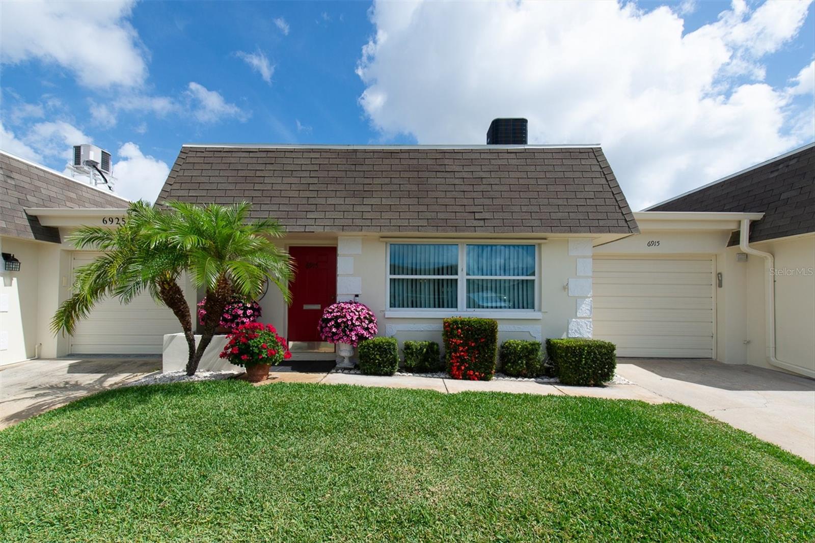A little touch of Versailles in the heart of Pinellas Park.
This charming villa brings together Old World style, custom craftsmanship, and easy Florida living. Set in a 55+ community with a name that already hints at French charm, this home takes the theme one step further with custom woodwork lovingly created by the owner, a skilled craftsman. From the custom kitchen island and pantry,  built-in shelving and picture-frame molding to coffered ceilings and detailed trim, every room offers something to notice, touch, and appreciate.

Behind the charm are practical updates for peace of mind: A/C 2025, electric panel 2018, roof 2026 (maintained by the association). Other fabulous extras: a whole-house water softener system and a reverse osmosis system in the kitchen, bidets on both toilets, custom closets, windows 8 to 10 years old (and they have the light hurricane panels that install quickly)

Vendome Village offers a low-maintenance 55+ lifestyle with community amenities and a central Pinellas location near beaches, shopping, dining, and everyday conveniences. Warm, distinctive, and full of character, this is not just another villa, it is a home with a story.