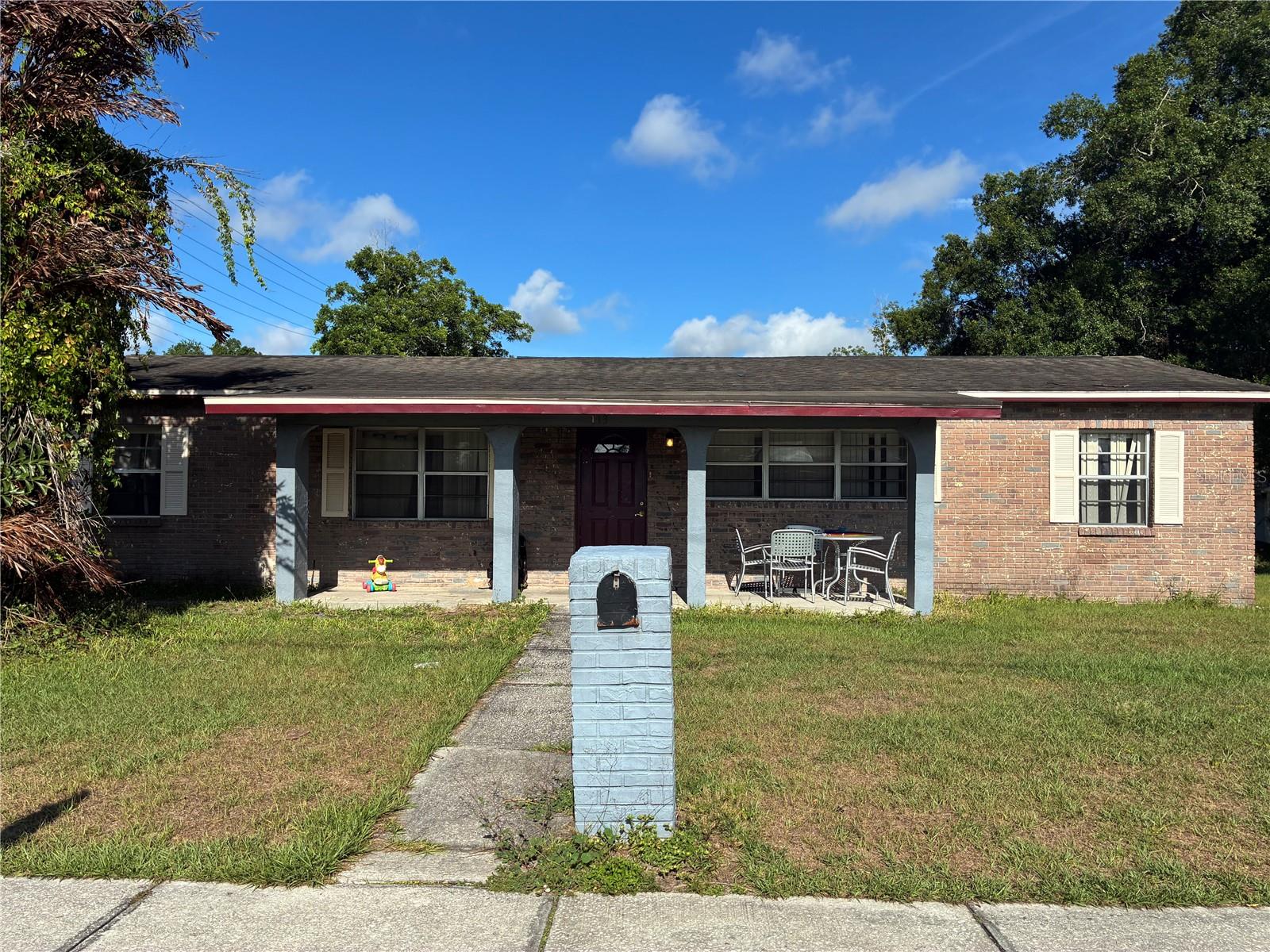AS IS DEAL! Investor Special with Endless Potential! Welcome to this spacious 4-bedroom, 2-bath solid block home offering approximately 1,940 total square feet with a 1-car garage, situated on an oversized quarter-acre corner lot in the heart of Plant City. This property is packed with opportunity and is ideal for investors, renovators, or large families looking to create their dream home. Conveniently located directly across from Marshall Middle Magnet IB World School and just minutes from Interstate 4, this location offers both accessibility and privacy.

The home features a shingle roof, updated central air and heat, tile flooring throughout, and stainless steel appliances. With a little TLC, this property can truly shine and offers excellent income-producing, rental, or resale potential. Enjoy the freedom of NO HOA and no lease restrictions, making this property perfect for homeowners, investors, pet owners, or those needing extra flexibility. The oversized lot provides ample outdoor space for entertaining, family gatherings, special events, or future possibilities. Roof is 10 years old, HVAC system is 9 years, pvc plumbing in great condition. Don’t miss this chance to invest in a property with great bones, generous space, and unlimited potential! Buyer must verify all information in listing. POF to must be provided with all offers. Property is available AS IS!