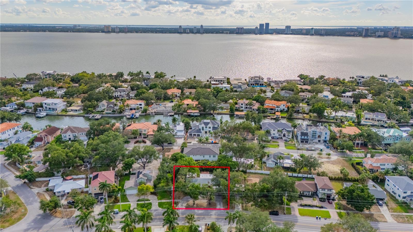 An exceptional opportunity to create your dream estate on an oversized double lot measuring 105' x 113' (.27 acres) in the heart of prestigious Davis Islands, one of South Tampa's most coveted neighborhoods. The existing home sustained damage from Hurricane Helene, presenting a rare blank canvas to design and build a custom residence tailored to your vision. The expansive homesite provides ample space for a sprawling luxury home, resort-style pool, guest house, and generous outdoor living and entertaining areas—an increasingly rare offering in South Tampa. Enjoy the unmatched Davis Islands lifestyle with charming shops, restaurants, Tampa General Hospital, and the vibrant village center just a short walk, bike ride, or golf cart ride away. Located only minutes from Downtown Tampa, Water Street, Channelside, and premier sports and entertainment venues, residents also enjoy exclusive amenities including a beach, marina, yacht club, parks, tennis courts, community pool, and private airport. This is a rare opportunity to secure one of the area's larger homesites and build a legacy property in one of Tampa Bay's most iconic and desirable waterfront communities.