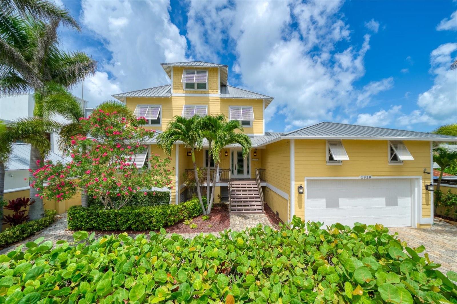 The select few who seek the best in beachfront living will appreciate this coastal designed beautiful residence. Located in a private area off of major access roads on the Gulf of Mexico and accessed through a private walled and gated entry, the home has over 4,000 square feet of living area and offers an exceptional floor plan of five bedrooms all with en-suite baths, office, media room, and main level gathering areas. Complete concrete block exterior construction with energy efficient attributes such as solar energy, automated systems and smart home technology availability, the property is a rare find in today’s market. Sweeping terraces encompass the rear of the home where Gulf breezes lend to relaxation and enjoyment of mesmerizing views of turquoise blue waters and miles of white sandy beaches. With 75 foot of beachfront and 153 foot in depth, the outdoor environment provides ample area for the walk-in beach side heated pool with  hot tub, putting green and  large gazebo. Bathed in natural light and detailed to perfection, the interior boasts coffered ceilings, custom architectural millwork, abundant built-ins, wet and dry beverage bar areas, gleaming granite and wood floors, and an oversized glass elevator. The kitchen is a culinary delight for all to enjoy! With its spacious center island, remarkable storage, exquisite cabinetry and top of the line appliances, the most selective chefs will appreciate preparing meals in a setting so delightful that every day feels  like a holiday! Offered completely furnished, the home exudes privacy, comfort, yet understated elegance and is the perfect setting for a full time residence, vacation home or investment property. Indian Rocks Beach is a very popular destination offering an array of recreational activities, shopping and fine restaurants yet has easy access to neighboring cities of Tampa and St Petersburg. Expansive areas to live beautifully by the sea, magical sunsets, and a coastal retreat that will create memories for a life time-don’t miss this one!