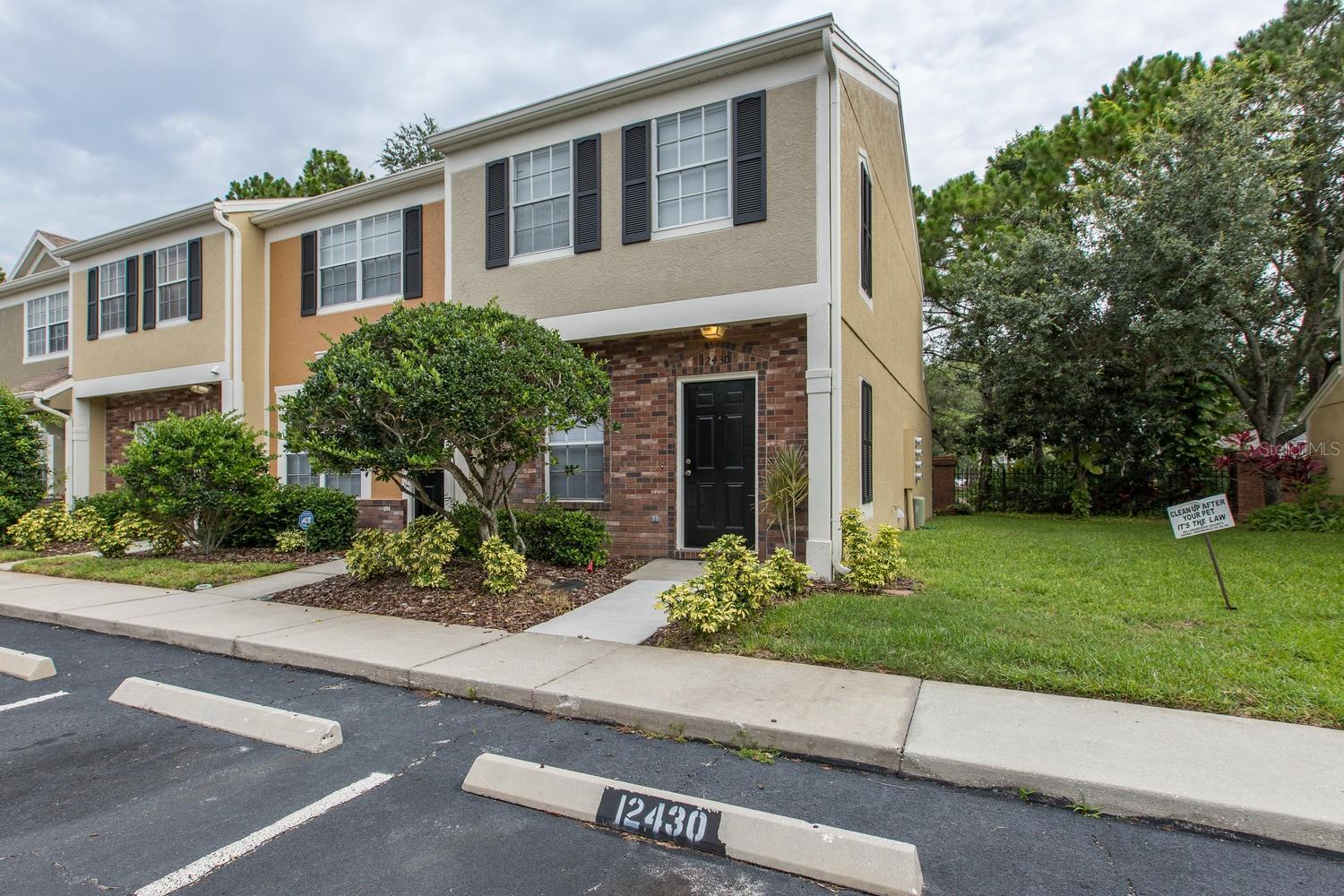Come Live the Maintenance Free Lifestyle in Westchase! Extremely Well Maintained and Cared for Larger End Unit in the Popular Berkeley Square Subdivision. This Townhome Features Two Larger Bedrooms, Two Full Bath and a Half Bath on the Ground Floor Level. Open Floorplan Living Offers 1st Floor Kitchen Featuring Granite Counters Tops, Marble Tiled Flooring, Stainless Appliances Package with Newer Microwave, Dishwasher, Range and Real Wood Cabinetry. Main Living area features Newer Greyed Wood Tinted Laminate Flooring and Offers Easy Access to the Screened In Private Porch and Storage Closet. Dining Area and Living Room are Combined Which Offers Lots of Different Design Possibilities. Upper Level has 2 Master Styled Bedrooms with En-Suite Bathrooms. Additional Features Include Inside Laundry Room, Newer A/C Unit, Recently Remodeled 2nd Full Bath, Marbled Tiled Entry, Bathrooms and Kitchen Flooring, Newer Ceiling Fans and Light Fixtures. Easy Walking Distance and HOA Access to the Two Westchase Swim and Tennis Complexes, Two 5 Acre Parks Which Offers Basketball Courts, Youth Play Areas and Open Grass Areas Perfect for Jogging and the Pet Enthusiasts. Close to Westpark Village Which Offers Shopping, Restaurants, Wine Bar, Ice Cream Shops, Table Tennis and Movie In the Park Nights. Close to Publix, Local Restaurants All Within an Easy Walk From Berkeley Square. Easy access to Tampa International Airport and the Beaches. A+ Rated Schools.