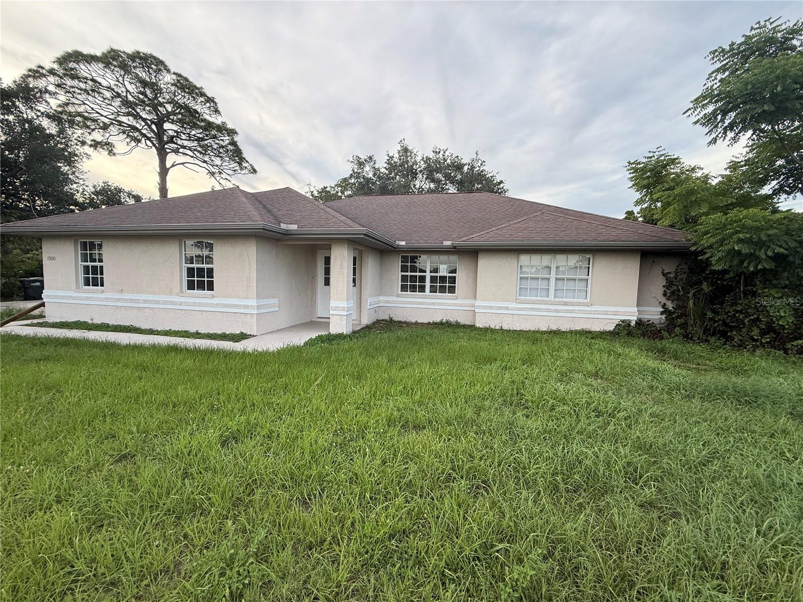 Discover the possibilities with this spacious waterside home situated on an oversized 18,393-square-foot homesite along the Blue Ridge Waterway in North Port. Nestled along a peaceful canal setting, this property offers a natural Florida backdrop where you can enjoy fishing from your own backyard while appreciating the surrounding wildlife and outdoor scenery.

Built in 1999, this three-bedroom, two-bath residence offers 1,615 square feet of living area with laminate flooring throughout. The floor plan features a comfortable living area, kitchen with an eat-at counter and breakfast nook, inside laundry closet, and an expanded lanai that provides additional outdoor living space overlooking the natural waterside setting.

The large side-entry two-car garage enhances both curb appeal and functionality while the oversized lot offers room to enjoy privacy and the outdoors. Recent improvements associated with the Price Boulevard road widening project are designed to enhance future traffic flow and accessibility throughout this growing area.

Located approximately two miles from the North Port Aquatic Center, residents enjoy convenient access to pools, water slides, recreation programs, parks, walking trails, and community activities. North Port continues to be one of Southwest Florida’s desirable communities, offering year-round opportunities for boating, fishing, golfing, nature parks, and outdoor recreation.

Beautiful Gulf beaches, including Sarasota, Venice, Englewood, Boca Grande, and Sanibel Island, are all within reach, making this an excellent opportunity to enjoy the Southwest Florida lifestyle. Whether you are seeking a primary residence, seasonal home, or investment property, this waterside setting offers exceptional potential.