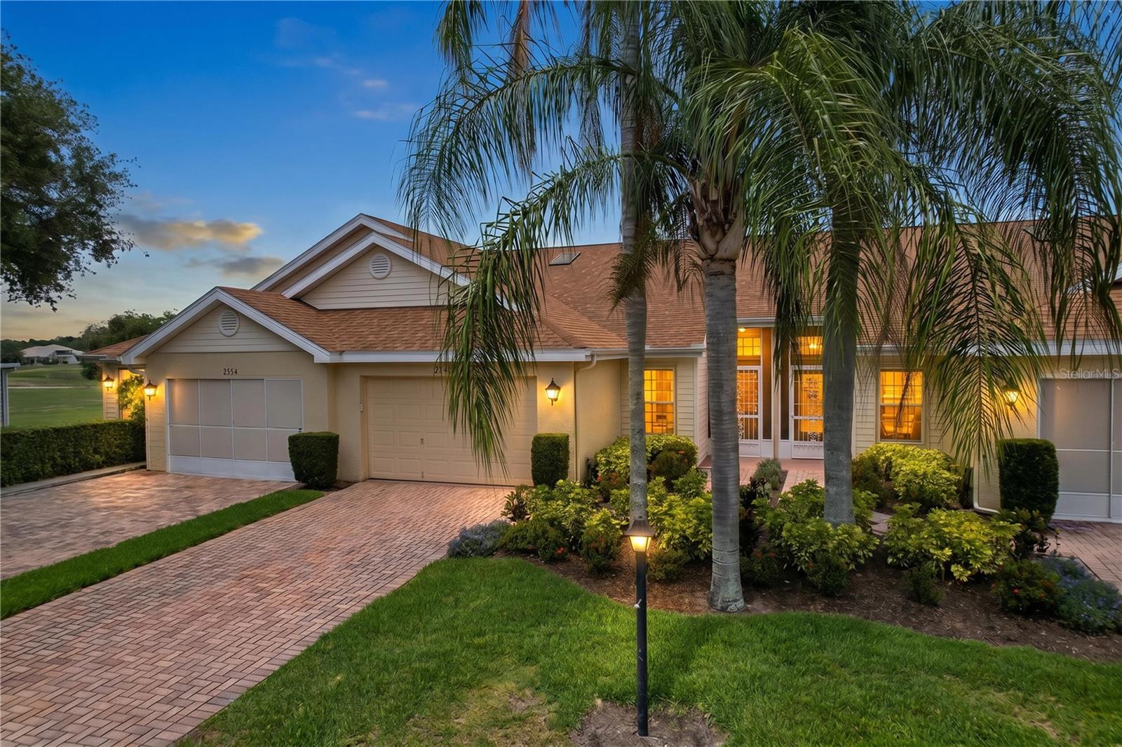 Welcome to peaceful waterfront living in the highly sought after Kings Point community of Sun City Center, where maintenance-free living, resort-style amenities, and golf cart accessibility create the perfect over 55 Florida lifestyle. Perfectly positioned on a quiet cul-de-sac with tranquil pond and conservation views, this beautifully updated Concord floor plan offers the rare combination of privacy, natural beauty, and modern interior updates. From the moment you enter, you’ll notice the bright, open feel created by vaulted ceilings, abundant natural light, and expansive rear windows that showcase the serene setting beyond. This home underwent a complete renovation in 2025, featuring luxury vinyl plank flooring throughout, fresh Sherwin Williams interior paint, scraped and refinished ceilings, updated ceiling fans and light fixtures, and custom shiplap accent details that add warmth and character to the home. The kitchen has been tastefully updated with quartz countertops, tile backsplash, undermount sink, stainless steel appliances (counter depth refrigerator), sliders in lower cabinets for easy access, and breakfast bar seating that opens seamlessly to the main living area - ideal for both everyday living and entertaining. One of the home’s standout features is the spacious Florida room, where panoramic water and conservation views create a peaceful backdrop year-round. Whether enjoying morning coffee while watching the sunrise and wildlife over the water or unwinding at the end of the day, this space truly captures the beauty of Florida living. The split-bedroom floor plan offers privacy for owners and guests alike. The spacious primary suite accommodates king-size furniture with ease and features a walk-in closet along with an updated en-suite bathroom offering stone countertops, newer vanity, and walk-in shower with glass enclosure. The guest bathroom has also been updated with a new vanity and tub/shower surround. Additional highlights include inside laundry, updated plumbing and electrical, an extended paved driveway, covered breezeway entry, and a 1.5 car garage with room for both a vehicle and golf cart. This home comes with a 13 month home warranty for buyer’s Peace of Mind and to help make transitioning easier! Kings Point residents enjoy access to indoor and outdoor heated pools, pickleball, fitness centers, cafés, restaurants, salon services, clubs, social activities, security, and more. Monthly fees include roof repair/replacement, exterior painting, cable, internet, exterior insurance, grounds maintenance, water, sewer, trash, pest control, and more. Conveniently located near Tampa International Airport, Sarasota, Gulf beaches, and Ellenton Premium Outlets. Beautifully updated and surrounded by nature, this is the kind of peaceful Florida retreat buyers dream about. Room sizes are approximate – Buyer must verify.  PLEASE CLICK VIRTUAL TOUR LINK.