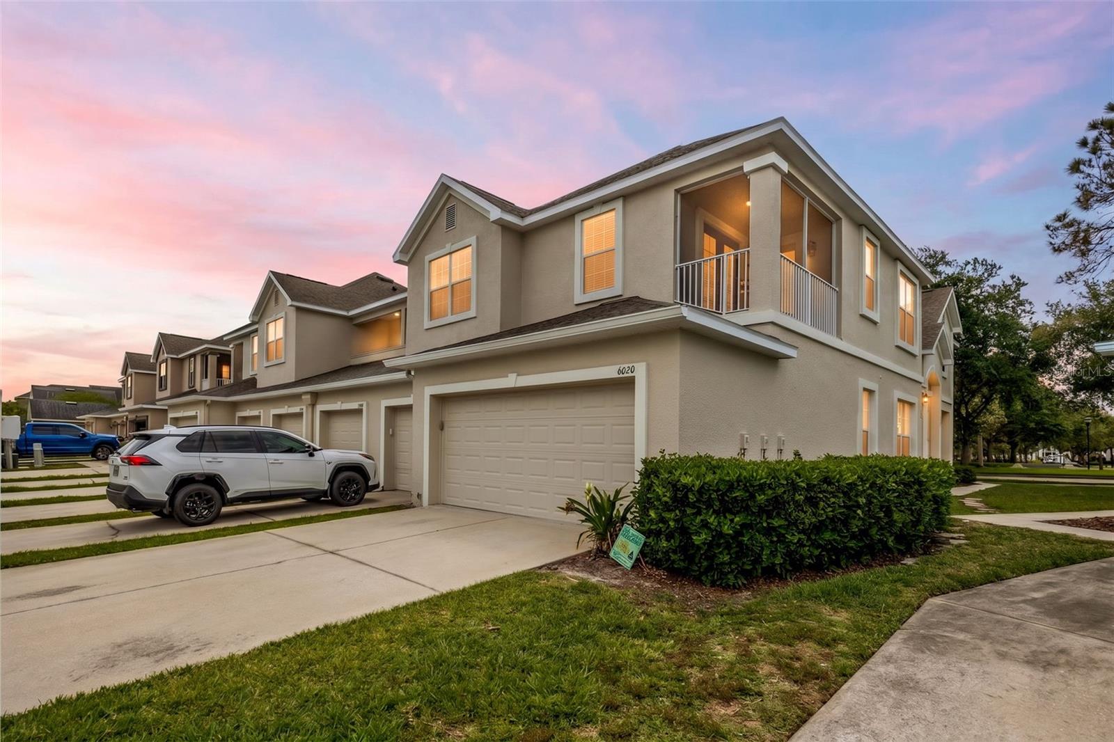 Looking for a move-in ready home or CASH-COW investment property? Look no further! This immaculate townhome is conveniently located in the highly sought after GARDEN DISTRICT OF FISHHAWK RANCH, DIRECTLY ACROSS FROM PARK SQUARE, where you can walk to local restaurants and shops, yoga studio, and many of the great amenities offered in this exclusive community. PRICED SEVERAL THOUSANDS BELOW RECENT APPRAISED VALUE for INSTANT EQUITY! This is perfect for easy living as well as being a fabulous long-term rental property! This lovely 2 bedroom, 2.5 bath luxury condo offers a great layout, modern architecture, and soaring ceilings, providing a feeling of spaciousness that FAR EXCEEDS the square footage! You are sure to love the attention to detail, such as built-in niches in the great room that can accommodate a 55-inch television, crown moulding throughout, and precision use of living space. The additional loft is a great bonus, making it a perfect playroom for the little ones, tv room, hang out space for teens, workout space, or office space. This gem has it all! Downstairs is your primary living space with open sight lines, ceramic tile throughout, an open floor plan, storage closets, and the half guest bath. The kitchen boasts real wood cabinetry with 42-inch uppers, granite countertops, stainless steel appliances, pantry closet, and breakfast bar seating adjacent to the open dining room. Upstairs you will find the bedrooms, full guest bathroom, nice size laundry room, and screened-in balcony, accessible from the guest bedroom as well as the loft. The large primary suite features a spacious garden tub with separate shower, water closet, granite counters in the dual sink wood vanity, and a large walk-in closet. There is plenty of storage for your cars, bikes, and hiking gear in the 2-car garage. The roof and dual-zoned HVAC were replaced 6 years ago, making it move-in ready, and with the seller-paid HOME WARRANTY, you will have peace of mind with this FishHawk beauty! Amenities include numerous resort style pools, miles of biking / hiking trails, tennis, basketball courts, playgrounds, dog parks, gym, year-round events, and access to all the niceties and conveniences Fishhawk has to offer, making this a perfect home for an active owner or a fabulous investment property!