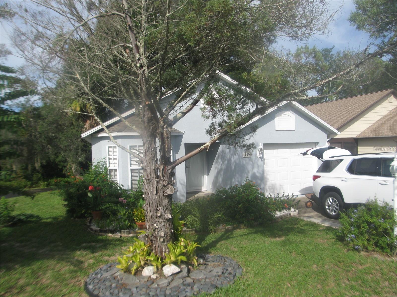 This 55 and older property is located away from the hustle and bustle yet close to EVERYTHING. Major Highways, shopping, and restaurants. This community and home are very well maintained. The home is located at the end of the road on a cul-de-sac. Walking and biking path run just outside your door. The screened in back porch overlooks a wooded lot with plenty of privacy. It would be a great place to relax at the end of a long day. Very large living area and both bedrooms have their own bathrooms. The kitchen has an eating counter and a separate dining area. Lawn care, basic cable and community pool is a short drive or bike ride away. This home will go quickly so, don't wait too long!!
