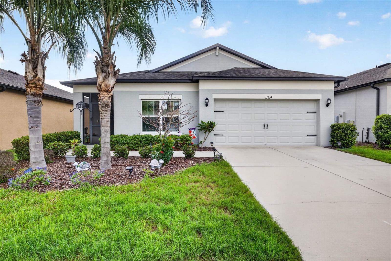 Welcome to this beautiful Southfork community solar-powered home in the highly sought-after South Fork Lakes community. Located in one of the area’s fastest-growing corridors close to shopping, dining, and major highways for an easy commute. Situated on a conservation lot with no backyard neighbors ever, this home greets you with two welcoming palm trees. This home makes a stunning first impression from the moment you arrive. Step inside to discover elegant living areas finished with tile floors and a thoughtful layout designed for both everyday comfort and effortless entertaining. The open kitchen is the heart of the home, featuring quartz countertops, a stylish backsplash, a custom-built pantry, an island with bar stool seating. The dining room and living room flow seamlessly from the kitchen, creating a bright and inviting space perfect for gatherings. The living room features sliding glass doors that open directly to the lanai, blending indoor and outdoor living beautifully.  You’ll also find a flexible formal room with accent wall and fireplace, that can be used as a dining room, home office, or additional sitting area — giving you options to fit your lifestyle. The oversized primary suite offers a private retreat with a spacious bedroom, a large walk-in closet, and a roomy en-suite bath complete with dual sinks. Fresh neutral paint throughout add timeless style and warmth. Two generously sized secondary bedrooms ensure everyone has space to spread out comfortably. The spacious covered lanai offers plenty of room for both lounging and outdoor dining, creating the ideal space for entertaining or unwinding at the end of the day. This home comes with hurricane shutters for peace of mind, and this eco-friendly SOLAR home is designed for efficiency and major cost savings with the average electric bill under 15.00 a month. The solar lease will transfer to the new owner, making the transition seamless.  Residents of South Fork Lakes enjoy resort-style amenities including a community pool, clubhouse with fitness center, and playground — all designed to complement the Florida lifestyle. With many A rated school options this home has everything a family needs to create a Florida lifestyle.  Schedule your private showing today.