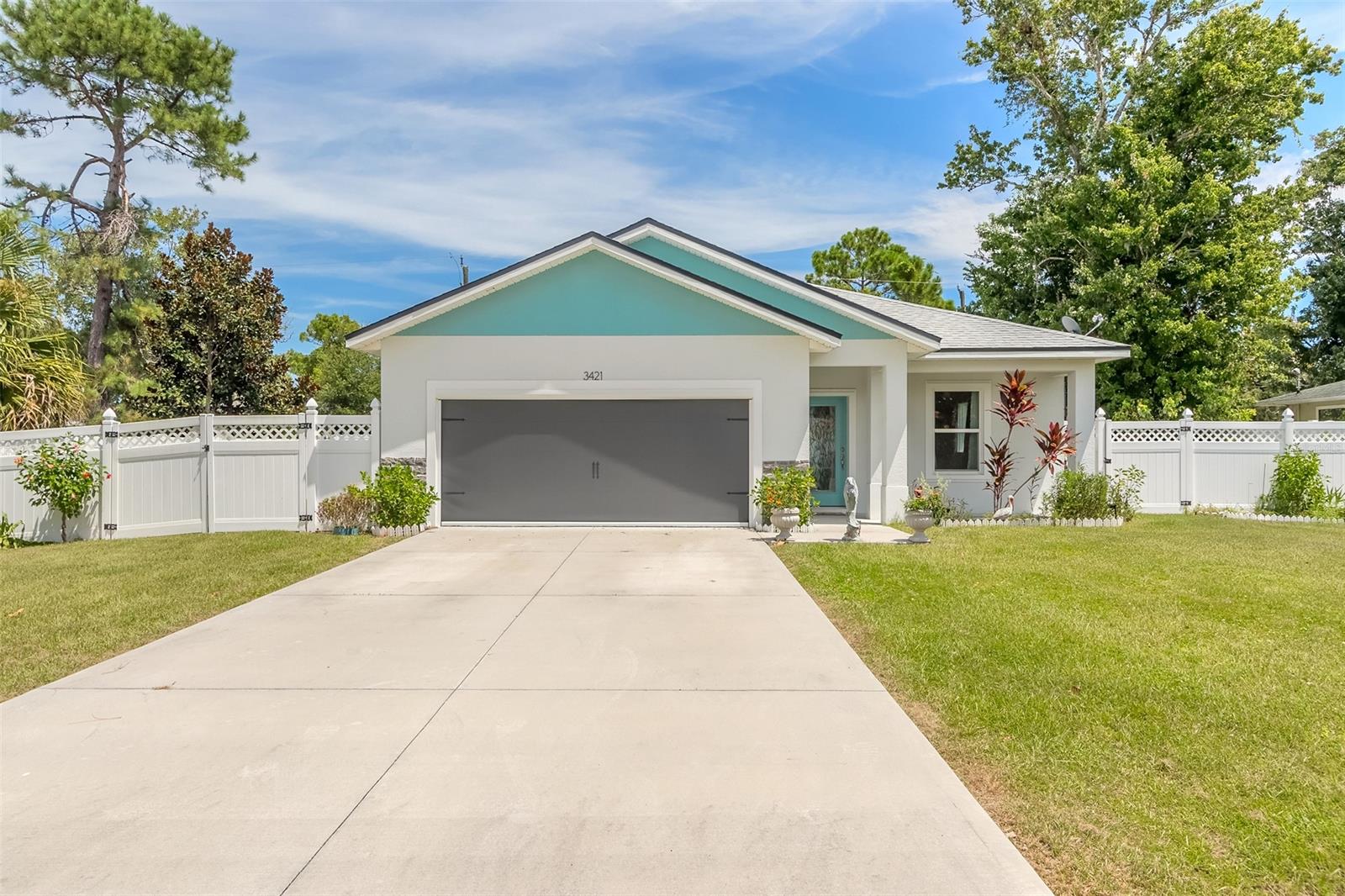 Beautiful Florida Shores home built in 2021 with NO HOA on an oversized lot!! Open concept floor plan with tons of upgrades including a motorized garage screen, new fence, interior doors, hurricane shutters, and luxury vinyl plank flooring to name a few. The eat-in kitchen features gorgeous quartz countertops, white shaker cabinetry, SS appliance package, breakfast bar, center island, large walk in pantry, and a gas stove. The primary ensuite is spacious and thoughtful with his and hers walk-in closets, dual sink quartz vanity, and floor to ceiling tile in the shower. Sliding glass doors lead out to the covered back porch and Large private backyard. The current owner recently added the most spectacular ''She Shed'' equipped with air conditioning that can be used as a private getaway,
art studio, or play house! All sizes are approximate. All information deemed accurate but cannot be guaranteed. Call for your private showing today! ;Water: City