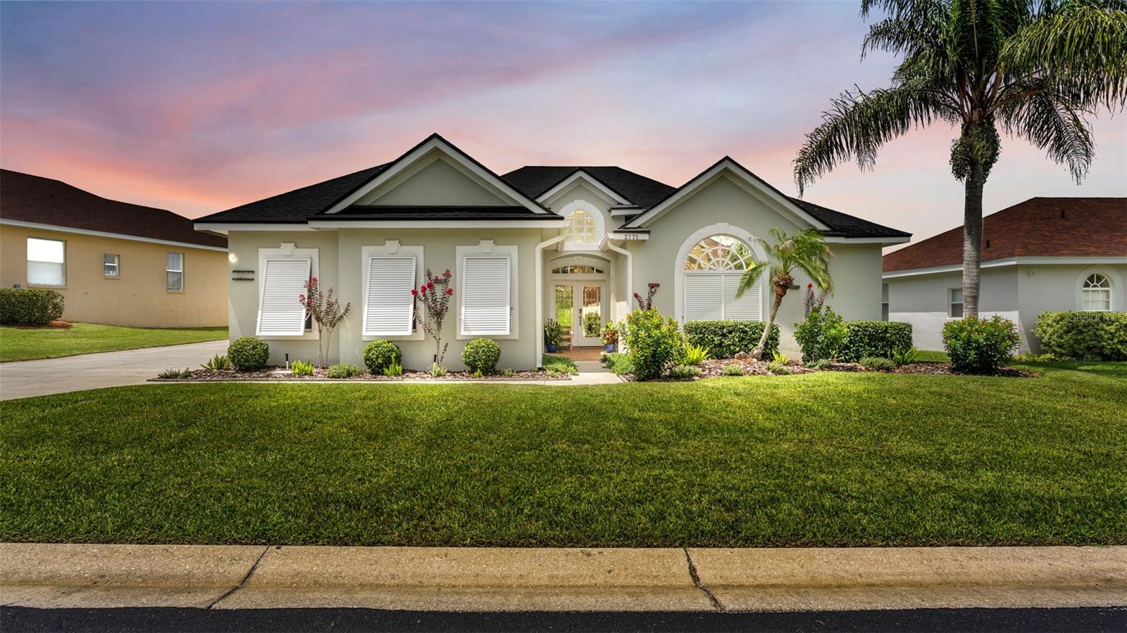 WELCOME to this beautifully maintained 3-bedroom, 2.5-bath home located in Highlands Creek, a gated South Lakeland community just off Crews Lake Road and convenient to shopping, dining, medical facilities, and desirable school zones.
Distinctive Bahama shutters and attractive landscaping create wonderful curb appeal. Inside, the home feels bright and welcoming, with abundant natural light, an open-concept layout, custom light fixtures, vaulted and tray ceilings, and porcelain tile flooring throughout. Plantation shutters enhance every interior window, adding both style and privacy.
The spacious living room area, with a built-in stacked stone fireplace that adds ambience, flows seamlessly into the dining area and kitchen, making the home ideal for everyday living and entertaining. The kitchen offers granite countertops, resurfaced cabinetry, newer stainless-steel appliances, and plenty of workspace and storage.
The split-bedroom floor plan provides privacy for the generously sized primary bedroom suite, which includes a spacious ensuite bathroom with a double-sink vanity, walk-in shower, and a garden tub. Two additional bedrooms and a well-appointed guest bathroom are located on the opposite side of the home.
Sliding glass doors open to a screened back porch overlooking the beautifully landscaped, fully vinyl-fenced private backyard. A side paver patio provides additional outdoor space for grilling, relaxing, or entertaining. Hurricane shutters provide added peace of mind.
Additional features include an interior laundry area with a newer washer and dryer that will remain with the home, and a two-car garage with an epoxy-coated floor. Both the roof and air-conditioning system are approximately five years old.
With its open layout, natural light, stylish finishes, inviting outdoor spaces, and convenient South Lakeland location, this Highlands Creek home is ready to welcome its next owner.