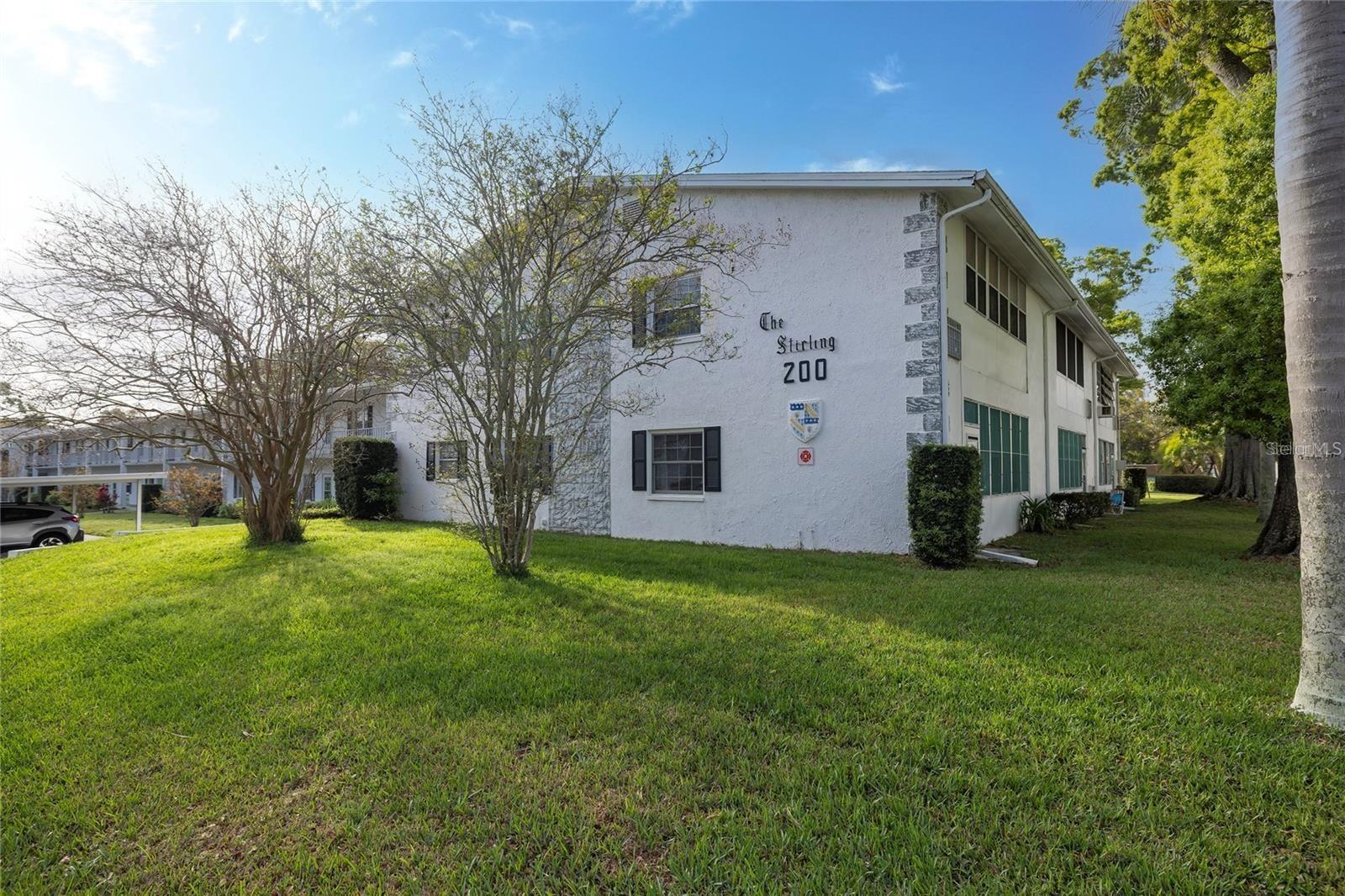 Welcome to the heart of charming Dunedin! Nestled within the highly desirable 55+ community of Douglas Arms, this beautifully maintained 2-bedroom, 2-bath condominium offers the perfect blend of comfort, convenience, and Florida lifestyle living. Ideally situated on the first floor, this light and bright residence is just steps from its covered parking space and directly across the courtyard from the community clubhouse, pool, and recreational amenities. Inside, you'll find a spacious 2 bedroom 2 bath floor plan designed for both privacy and functionality. The open living and dining areas create an inviting atmosphere and an abundance of natural light throughout. A versatile Florida room provides additional living space and is perfect for enjoying your morning coffee, reading a book, hosting guests, or simply unwinding after a day of exploring all that Dunedin has to offer. Residents of Douglas Arms enjoy a vibrant yet peaceful community atmosphere with amenities including a sparkling heated pool, shuffleboard courts, clubhouse activities, and beautifully maintained grounds. The monthly fee covers cable, water, sewer, trash, exterior maintenance, grounds maintenance, pest control, and recreational facilities, allowing for truly carefree living. Location is everything, and this home places you just minutes from the best of Florida's Gulf Coast lifestyle. Enjoy easy access to vibrant Downtown Dunedin with its unique shops, local breweries, waterfront parks, festivals, and award-winning restaurants. Explore the scenic Pinellas Trail, spend the day at the Dunedin Causeway, or take a short drive to Honeymoon Island State Park and some of the area's most beautiful beaches. Boating, fishing, golfing, arts, entertainment, and endless outdoor recreation are all within reach. Whether you're looking for a seasonal retreat or a year-round residence, this move-in ready home offers an exceptional opportunity to personalize your personal retreat and enjoy the relaxed coastal lifestyle that makes Dunedin one of Florida's most sought-after destinations. Douglas Arms is a no-pet, no-rental community, ensuring a quiet and well-maintained environment for its residents. Don't miss your chance to call this Dunedin gem home!