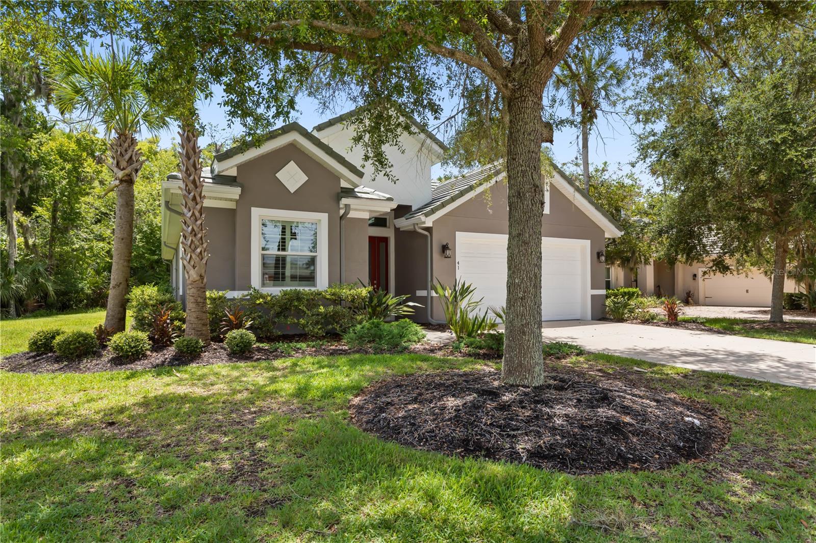 Virtually Staged. Experience refined coastal living in this beautifully appointed 4-bedroom, 2-bath residence, perfectly situated within one of Palm Coast's premier gated Intracoastal communities. The Tidelands. Thoughtfully designed with timeless elegance and modern comfort, this exceptional home showcases soaring coffered ceilings, exquisite marble countertops, custom closet systems, stainless steel appliances, hurricane-impact windows, a durable tile roof, a finished garage floor, and a reverse osmosis water filtration system. The spacious screened lanai overlooks a tranquil preserve, offering a private and peaceful outdoor retreat with no rear neighbors—perfect for relaxing or entertaining in complete serenity.
Beyond the home, enjoy an unparalleled resort-style lifestyle with exclusive access to outstanding community amenities. Residents are treated to two resort-style swimming pools, tennis and pickleball courts, basketball courts, a state-of-the-art fitness center, an elegant clubhouse, scenic walking and biking trails, private day docks, two fishing piers along the Intracoastal Waterway, and countless opportunities to enjoy Florida's outdoor lifestyle. This is more than a home—it's an opportunity to embrace luxury living in a secure, amenity-rich waterfront community where every day feels like a vacation.