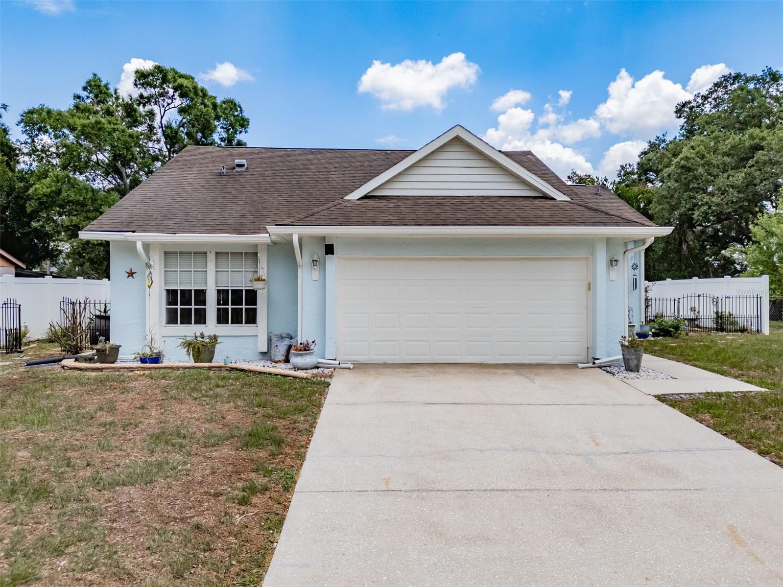 This 3 bedroom 2 bathroom home is centrally located in Valrico. The kitchen features granite countertops, stainless steel appliances, plenty of cabinets, an island with a bar top for casual dining and has a window overlooking the back yard. There is a 10x9 room off of the kitchen that is perfect for a dining room or a flex room. The family room is open & airy offering a stone wall, recessed lighting and glass sliders that open to the lanai. The primary bedroom is spacious and has a private bathroom and a walk-in closet. Enjoy your screen enclosed lanai with no back yard neighbors. There is a brick pavered deck in the backyard. The house was re-plumbed in 2018. Located just minutes from shopping and dining, Little Leauge fields, YMCA, schools, HWY 60, Lumsden and Bloomingdale. It is walking distance to the Middle School.