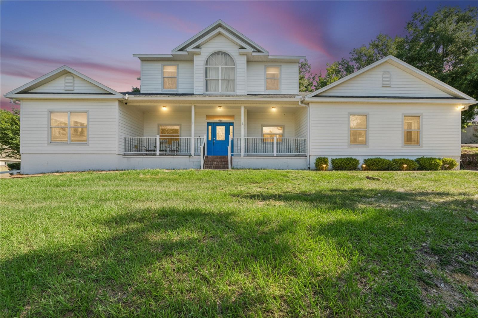 This stunning custom-built two-story home is nestled in the hills of Clermont boasting a highly sought-after address in Minneola. Situated on nearly one acre of land with no HOA restrictions, this residence features three spacious bedrooms, including a master suite conveniently located on the ground floor. You’ll also find two and a half bathrooms, a dedicated office space, and a versatile bonus room upstairs.
Inside, the home showcases elegant custom tile flooring and modern stainless steel appliances, complemented by an oversized garage that provides ample storage or workshop space. The front porch serves as a serene retreat, perfect for unwinding while enjoying breathtaking sunset views.Additional highlights include a recently updated roof, a newer hot water heater, and a recently installed AC system for year-round comfort. Conveniently located near a new public school and a brand-new hospital, this home offers easy access to the Turnpike, placing you just five minutes away from Disney, Millenia, and the Orlando Airport. Don’t miss the opportunity to own this beautiful, move-in-ready home that perfectly combines luxury, comfort, and an ideal location in the heart of Minneola! Some photos have been virtually staged.