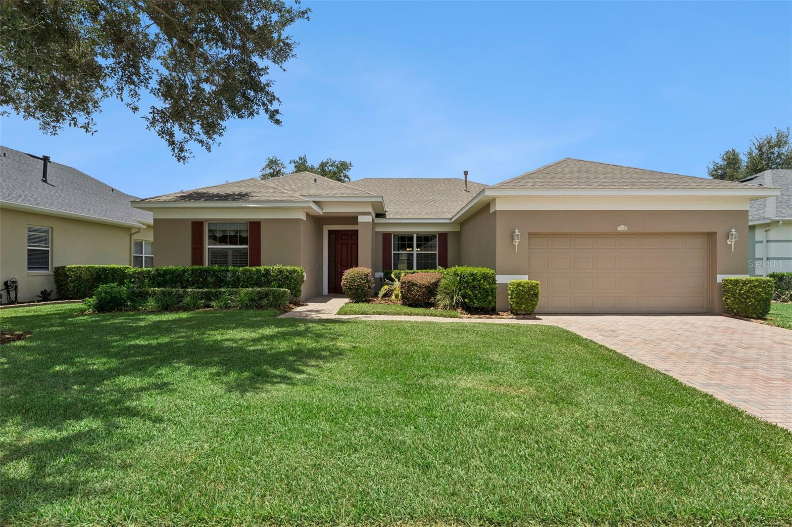 Welcome to Summit Greens, one of Central Florida’s 55+ guard-gated, golf cart friendly communities. This beautifully maintained 3-bedroom, 2-bath home offers 2,084 square feet of living space and is perfectly positioned on the golf course, providing peaceful views and a relaxing setting. The spacious floor plan features generous living and dining areas, a large kitchen, and a private primary suite designed for comfort and convenience. Whether you’re entertaining guests or enjoying a quiet evening overlooking the fairway, this home offers the perfect blend of space and lifestyle. Summit Greens is known for its outstanding resort-style amenities, including a community pool, tennis courts, pickleball courts, clubhouse, fitness center, and an active social calendar. With golf cart access throughout the community, you’ll enjoy a vibrant, low-maintenance lifestyle in one of Clermont’s most desirable active adult neighborhoods. Don’t miss this opportunity to enjoy golf course living in a community that truly has it all!