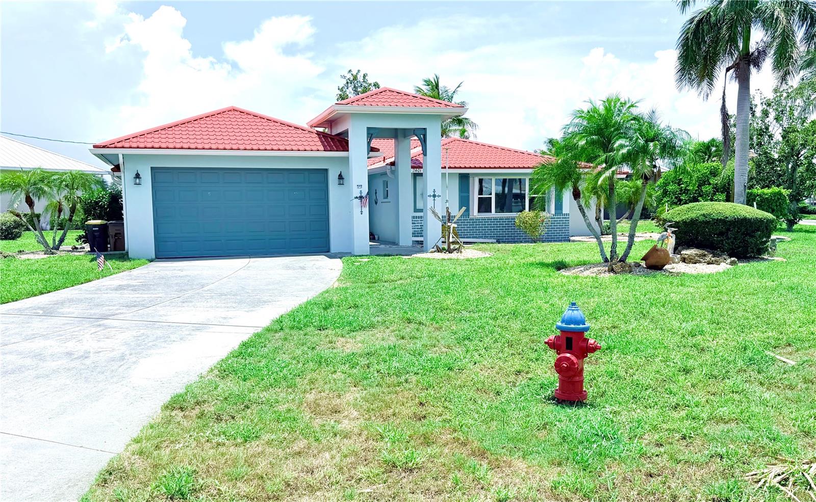 More photos to coming soon. Come see what this wonderfully located, corner lot waterfront property has to offer. With a beautiful inground pool overlooking the canal - this is a fisherman’s dream location, with direct access to the Gulf from your own backyard. This fixer-upper can be made into whatever the new owner decides, with endless possibilities. Features a large bonus room that can be utilized as a third bedroom, or a large Family/Florida room for more entertaining space. Plenty of room for those get-together with your family and friends. Gorgeous Permatile metal roof added in 2023. Inground pool resurfaced in 2025, pool pump was also replaced in 2025. Large screen pool enclosure added in 2025. Hot water tank 2024. HVAC 2017. Call today for your private showing.