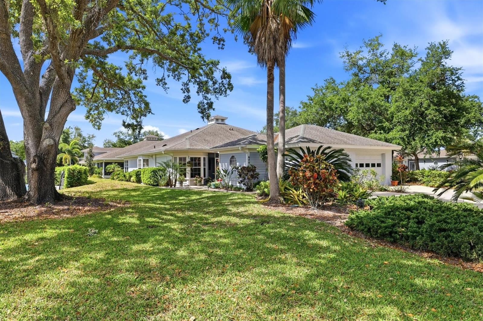 Welcome to 6401 Approach Road, a meticulously maintained villa nestled within the serene, tree-lined enclave of Westwoods at Sunrise. This spacious 1,275-square-foot residence features a thoughtful split-floor plan with two bedrooms and two bathrooms, designed to maximize both privacy and an airy, open-concept feel. Recent professional updates enhance the home’s appeal, including elegant quartz countertops, durable hard-surface flooring throughout, and a brand-new HVAC system installed in March 2026. The versatile, climate-controlled lanai offers the unique ability to function as an extended living area or a traditional outdoor porch.  In addition, there is a charming screened breezeway at the front door that is perfect for morning coffee, a meal, or tending to your tropical plants. Storage is a standout feature, from the oversized laundry room and numerous interior closets to the one-car garage with a dedicated storage bump-out. Residents of this active 55+ community enjoy two heated pools, a pet-friendly atmosphere (up to 25 pounds), no CDD fees, a year-round calendar of events, clubhouse, and four premier pickleball courts that residents and friends actively play. Perfectly positioned near I-75 and the world-class sands of Siesta Key, this villa represents the ideal Sarasota lifestyle for year-round residents and seasonal guests alike.
