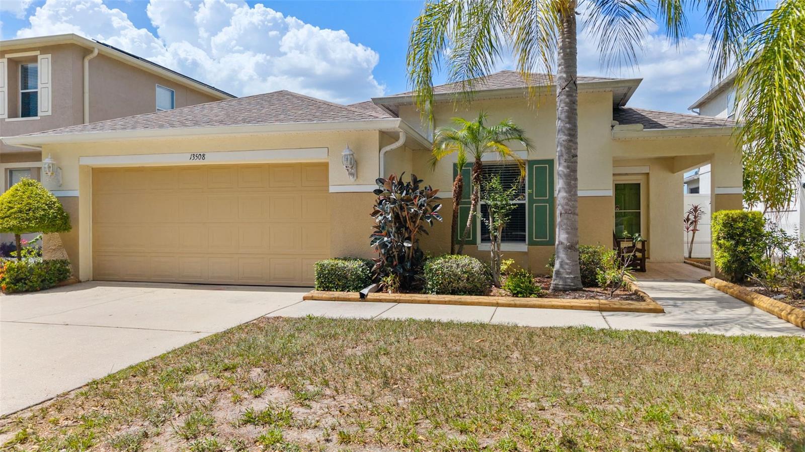 Welcome to this beautifully maintained 3-bedroom, 2-bath home in the highly desirable Boyette Creek community! Offering 1,716 square feet of thoughtfully designed living space, this move-in ready home features an open floor plan, high ceilings, crown molding, and spacious rooms throughout. The heart of the home is the bright, open kitchen featuring granite countertops, stainless steel appliances, a center island, tile backsplash, a pantry, and a generous dining area. Sliding glass doors lead directly to the oversized screened lanai, creating the perfect indoor-outdoor flow for entertaining or simply relaxing while enjoying peaceful pond views. The spacious primary suite offers plenty of room for a king-size bedroom set and features a large walk-in closet and an en-suite bath with a granite-top vanity, full-size linen closet, and abundant storage. Two additional bedrooms are generously sized with ample closet space and are conveniently located near the updated guest bath featuring a granite vanity, beautifully tiled walk-in shower, and glass enclosure. The oversized screened lanai with ceramic tile flooring serves as a true extension of the home's living space and overlooks the fully fenced backyard and tranquil pond. Whether you're enjoying your morning coffee or hosting friends and family, this outdoor space is sure to become a favorite. Recent improvements include a 2021 Roof, 2022 HVAC, a brand-new Hot Water Heater, and brand-new vinyl fencing. The thoughtfully designed fence provides added privacy while still allowing you to enjoy the peaceful pond views. Additional features include the washer and dryer, an oversized garage with an epoxy floor offering excellent storage, NO CDD, NO flood insurance required, low HOA fees, and newly installed sidewalks throughout the community. Enjoy a prime Riverview location just minutes from FishHawk's shopping, dining, parks, and amenities, and zoned for the highly sought-after Barrington Middle School and Newsome High School, offering an exceptional combination of location, lifestyle, and top-rated schools. If you've been searching for a move-in ready home with an open floor plan, spacious rooms, peaceful pond views, an exceptional outdoor living space, and major recent updates, this one is ready to welcome you home!