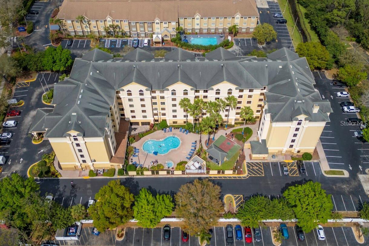 **Exceptional Investment Opportunity in the Heart of Orlando's Tourism District!**

Welcome to this attractively priced, fully furnished 1-bedroom, 1-bathroom condo-hotel located in the highly desirable StaySky Suites, just minutes from International Drive, Orlando's premier entertainment and vacation destination. Whether you're looking for a vacation getaway, an income-producing property, or the perfect combination of both, this turnkey residence offers outstanding value and convenience.

Designed for comfort and functionality, the spacious open floor plan seamlessly connects the living area, dining space, and kitchenette, creating an inviting atmosphere for owners and guests alike. The generously sized bedroom offers direct access to the bathroom, while charming plantation shutters add warmth and character throughout the unit. Being sold fully furnished, this property is ready for immediate owner use or enrollment in the professionally managed on-site rental program.

Guests and owners enjoy an impressive selection of resort-style amenities, including a heated swimming pool, relaxing spa, fitness center, basketball and sports court, business center, laundry facilities, beautifully maintained grounds, and a welcoming lobby lounge. Additional conveniences include on-site dining, complimentary theme park shuttle service, a 24-hour front desk, and abundant guest parking.

Ideally situated just minutes from Universal Orlando Resort, International Drive, ICON Park, SeaWorld Orlando, the Orange County Convention Center, Premium Outlets, world-class restaurants, shopping, and major highways including I-4 and Sand Lake Road, this location places everything Central Florida has to  within easy reach.

Zoned for short-term rentals, this is an excellent opportunity to own a professionally managed vacation property in one of Orlando's strongest tourism markets. Schedule your private showing today and discover the potential this exceptional investment has to
