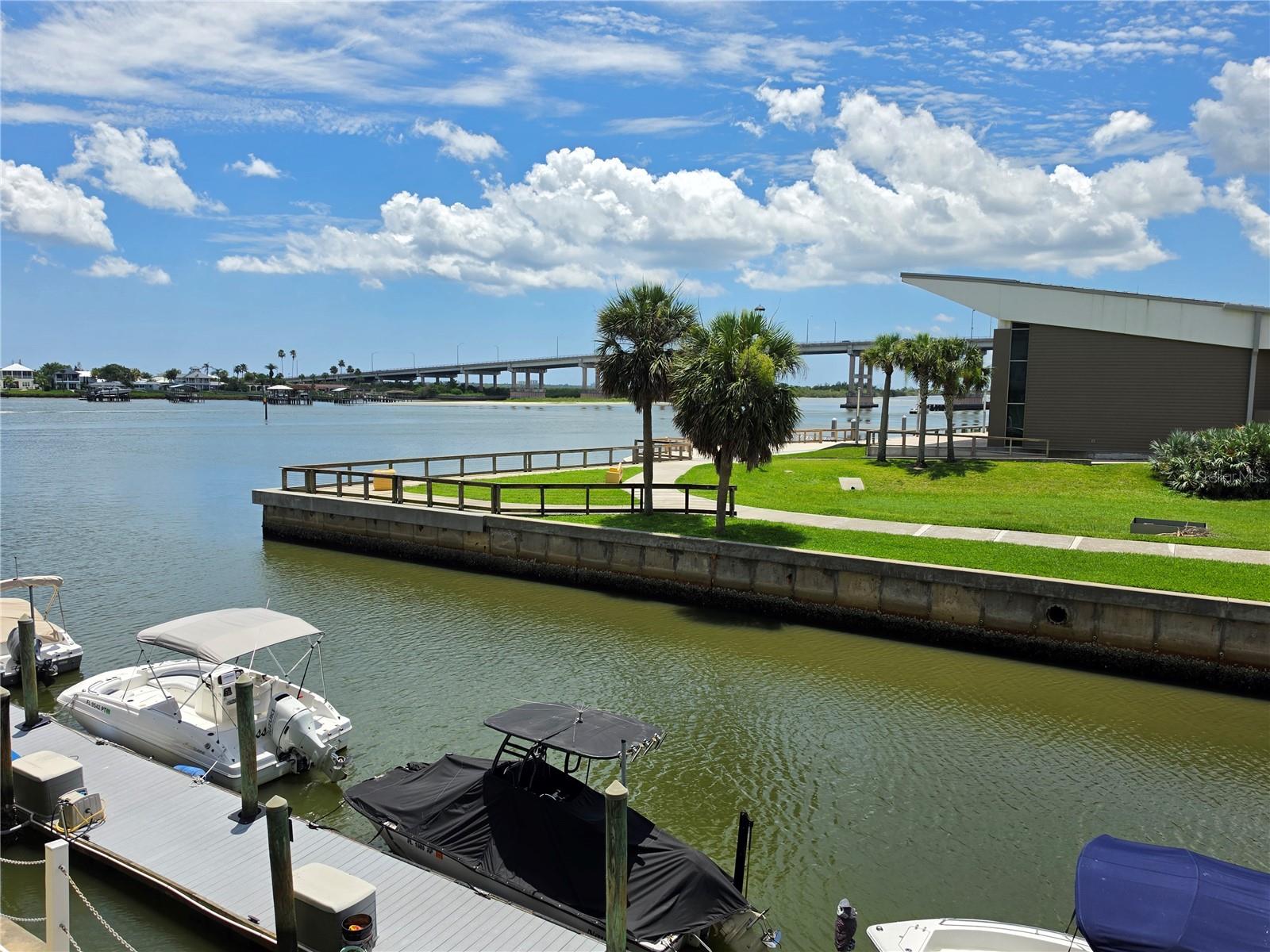Imagine watching manatees glide past your window while the Intracoastal shimmers just beyond.  2-bedroom,  condo offering 1,000 square feet of comfortable waterfront living in the heart of New Smyrna Beach—and priced for a quick sale.
This well-maintained home is ready for you to move right in, or unleash your imagination and remodel it into a personalized coastal retreat. The choice is yours. Either way, you'll savor an affordable price point paired with refreshingly low monthly fees—a rare combination in a community this special.
Life in this welcoming 55+ enclave means a sparkling pool, community boat slips for your watercraft, and a lively calendar of social gatherings. Best of all, you'll have a front-row view of holiday fireworks and the cherished annual boat parade, all from your own slice of the riverfront.
The location is hard to beat. Emory L. Bennett Park sits practically at your doorstep, while Historic Canal Street—brimming with restaurants, shops, a museum, and a weekly farmers market—is an easy stroll away. Art lovers will appreciate nearby Arts on Douglas, and Flagler Avenue's shoreline is close enough to reach by bicycle. Crave more adventure? Intracoastal water sports, Ponce Inlet Dog Beach, and JB's Lagoon Adventures round out the possibilities.
Whether you're seeking a turnkey getaway or a renovation canvas, this riverside gem delivers value, charm, and an unbeatable lifestyle. Come claim it before someone else does.