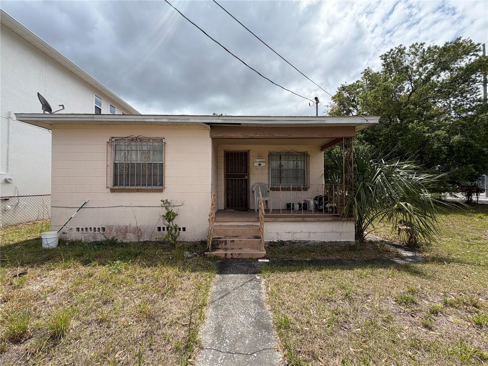 Welcome to 2342 W Chestnut Street—a rare dual-development opportunity on a 7,426 sq ft double lot in Tampa's desirable RMC-16 zoning district. This property consists of a single parcel with an established 900 sq ft residential home in sound structural condition, plus significant vacant land that can be developed or subdivided. Owner-occupants will appreciate the renovated home as-is, while developers and investors will see substantial profit potential: after renovation and new construction, this property can generate approximately $950,000 in combined sale value—with comparable luxury townhomes in the area currently selling for $525,000-$575,000, and renovated single-family homes commanding $360,000-$380,000. The RMC-16 zoning allows for multi-unit development without rezoning, making this an ideal project for builders seeking to maximize land utilization and ROI. Develop both properties simultaneously, renovate the existing home for immediate cash-out, or execute a phased approach—the flexibility is yours. Perfect for investors and builders looking to capture significant value in an established, accessible residential corridor with strong market demand for quality townhome construction.