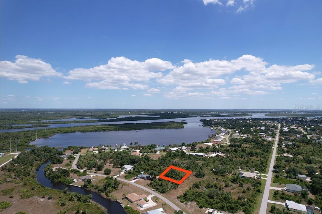 LOT NEAR WATERFRONT PROPERTIES, IN THIS UPSCALE AND GORGEOUS AREA OF PORT CHARLOTTE. THIS BEAUTIFUL LOT IS 80X125. A NON DEED COMMUNITY. NO ASSOCIATION. GROWING POPULATION. ALL UTILITIES AND INFRASTRUCTURE ARE AVAILABLE. BRAND NEW HOMES ARE BUILDING RIGHT NOW CLOSED TO THIS LOT, WHICH WILL BRING VALUE FOR THIS LAND IN THIS DEVELOPED AREA. A GREAT INVESTMENT OPPORTUNITY. CLOSE TO PLACIDA, CAPE HAZE. ONLY A FEW MILES NORTHEAST OF BEAUTIFUL BOCA GRANDE WHERE YOU CAN FIND WORLD-CLASS TARPON FISHING, A COUPLES MILES AWAY FROM THE GULF OF MEXICO. CLOSE TO SOME OF THE FINEST BEACHES. THIS SITE IS ALSO VERY CLOSED FROM ONE OF THE NATION'S TOP GOLF CLUBS, CORAL CREEK CLUB. EASY ACCESS TO MAJOR AIRPORT. WATER AND SEWER AVAILABLE WHICH WILL SAVE YOU THOUSANDS$$$ WHEN TIME COMES FOR CONSTRUCTION. IF YOU NEED HELP FINDING A BUILDER, PLEASE REACH OUT TO US, WE CAN ASSIST YOU. BUILD TODAY OR BUY TOMORROW FOR INVEST.