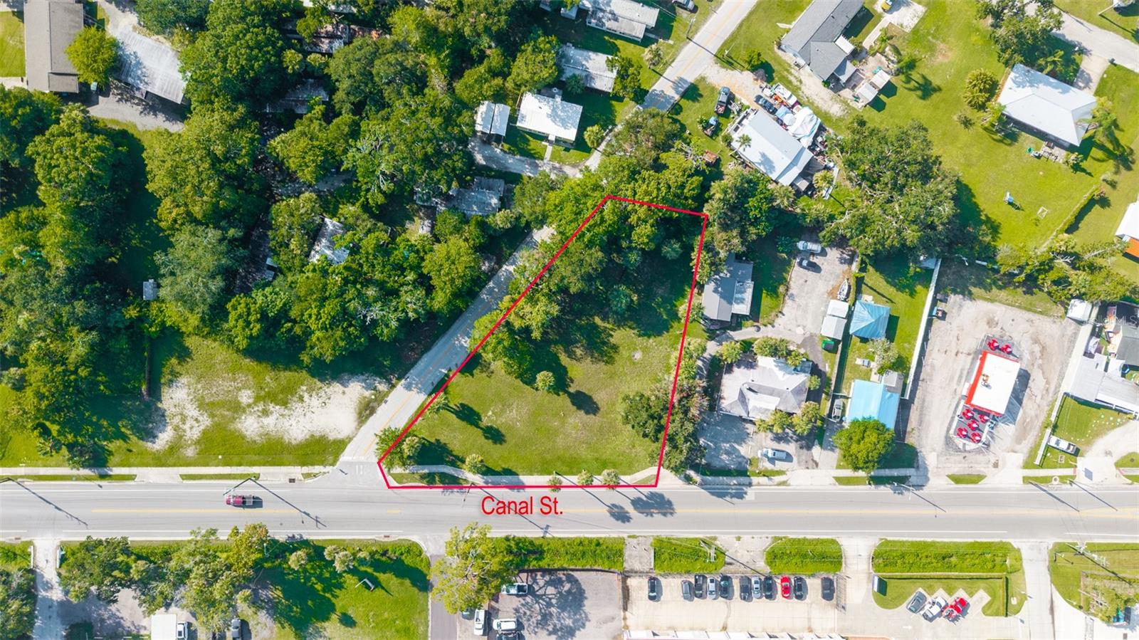 VACANT COMMERCIAL -- Rare opportunity to purchase vacant corner parcel on Canal Street / Business 44 and build your business in a perfect location. West Canal Street is on the rise with many new businesses opening in the last few years. The possibilities are endless -- build your business office, medical office, showroom, storage, or retail location. B3 Highway Zoning District allows for almost any type of business! The Daily Traffic Count of Canal Street is over 11,000 cars -- the ease of access and high visibility is ideal and does not get much better in New Smyrna Beach!