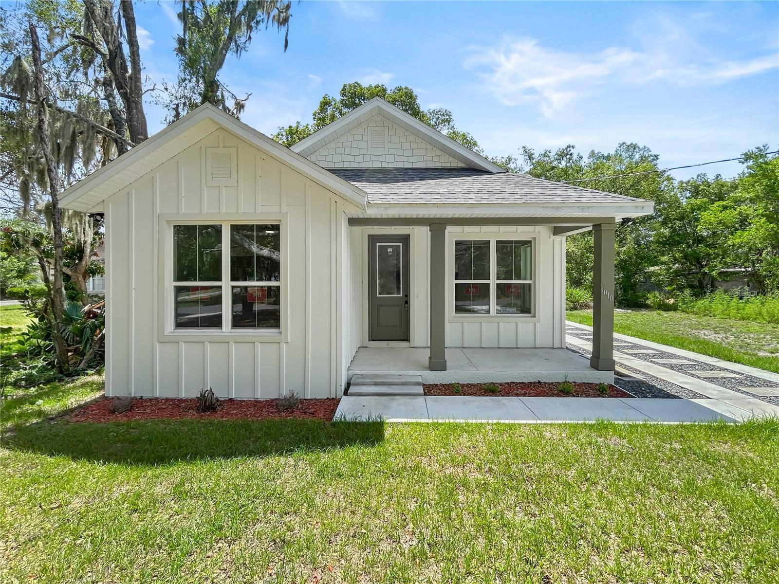 This charming cottage-style home offers 3 bedrooms, 2 bathrooms, soaring 9’4” ceilings, and a stunning 9-foot entry door — all thoughtfully upgraded with premium features throughout. Built in 2025 in the Georgetown Historic District, the area blends historic character with newer homes and ongoing growth throughout the community. The kitchen features generous cabinet space, a large island, stainless steel appliances, and sink for a sleek modern touch. Additional upgraded features include Moen plumbing fixtures, oversized 60-inch smart ceiling fans controllable from your phone, a laundry room with utility sink, covered front entry, and attic storage access.