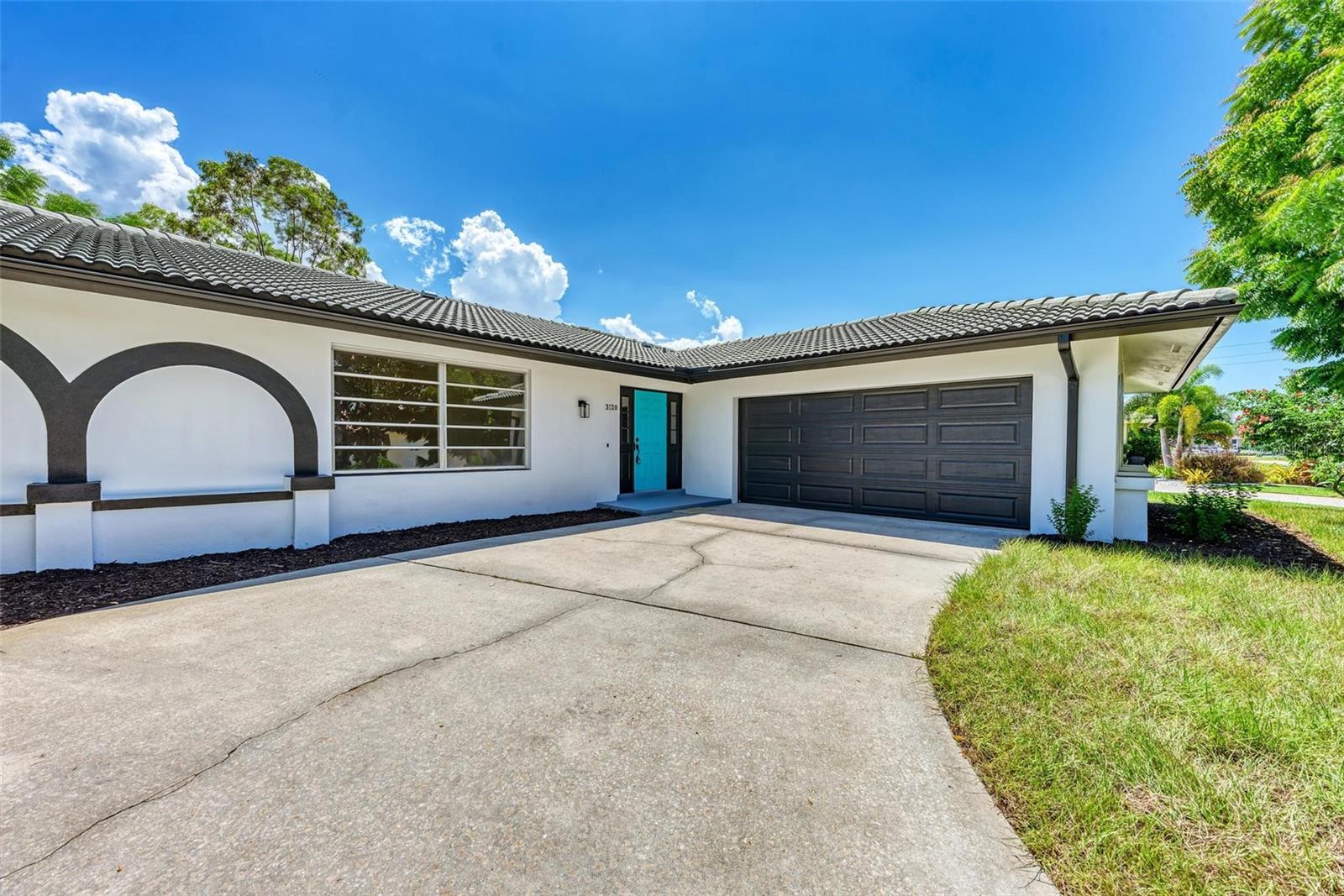 Welcome to a home that brings space, function, and everyday Florida living together in all the right ways. This single-story residence offers 3 bedrooms, 2 bathrooms, and an impressive 2,304 square feet of heated living space, giving you the kind of room that instantly feels flexible, comfortable, and ready for whatever life looks like next. Step inside and the layout opens with generous living spaces designed for connection. The living room, family room, and dining area create an easy flow for entertaining, relaxing, hosting, or simply enjoying quiet evenings at home. Ceramic tile flooring runs throughout, bringing a clean, cohesive look while keeping maintenance simple. Ceiling fans add everyday comfort, while central air and electric heat help keep the home comfortable year-round. The kitchen is practical and well-equipped, featuring stone counters and a full appliance package including a dishwasher, disposal, microwave, range, refrigerator, washer, and dryer. Whether you are preparing a casual breakfast, entertaining guests, or planning a full dinner spread, this kitchen is ready to work with you. The primary suite offers a spacious retreat with a built-in closet and a private bathroom nearby, while the two additional bedrooms also include built-in closets and comfortable proportions. Beyond the main bedrooms, this home really stands out with bonus spaces that give you options. A bonus room, office, and study or den provide room for remote work, creative projects, fitness, guests, storage, or whatever your lifestyle demands. This is not just square footage; it is usable, valuable space that adapts with you. Outside, the home sits on a landscaped 9,600-square-foot lot with paved street access and a welcoming walk-up presence. The attached 2-car garage adds convenience, storage, and protection, while the block construction, slab foundation, and tile roof offer classic Florida durability. Public water, public sewer, electricity connection, sprinkler meter, and laundry room hookups add to the home’s practical everyday appeal. This is the kind of property that gives you room to breathe, room to grow, and room to make it your own. Spacious interiors, multiple living areas, dedicated flex rooms, stone counters, tile flooring, an attached garage, and a comfortable single-level design all come together to create a home with real presence and real potential. Listing agent is the owner of the property and has never lived in the property.