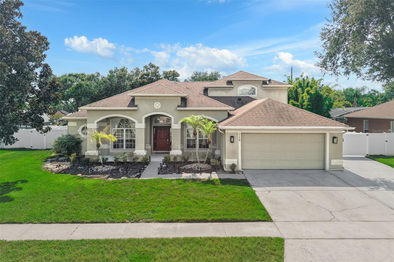 Fully Renovated Gotha Retreat in Windermere Chase
718 Little Hampton Lane, Gotha, FL 34734 5 BR | 3 BA | Fully Upgraded | Oversized Lot

Welcome home to this stunning, fully renovated two-story estate located in the highly sought-after, quiet enclave of Windermere Chase in Gotha. Blending timeless Florida charm with high-end modern upgrades, this rare 5-bedroom, 3-bathroom masterpiece sits on an expansive lot, offering unparalleled comfort, style, and peace of mind.

The Heart of the Home: Custom Gourmet Kitchen & Living
Step inside to find gorgeous luxury vinyl plank flooring flowing seamlessly throughout the main living areas, complemented by pristine porcelain and ceramic tile in the bathrooms. The custom-built chef’s kitchen is an absolute showstopper, featuring:

Premium Cambria Quartz countertops (also featured in the fully upgraded laundry room).

Sleek stainless steel appliances, including an LG refrigerator with a built-in Craft Ice maker.

A brand-new range to be installed prior to closing.

Thoughtfully designed cabinetry with fronts that can easily be swapped for a fresh look in the future.

Energy-efficient LED lighting illuminating the entire home.

Exceptional Layout & Dual Retreats
Designed with maximum flexibility, the floor plan easily accommodates multi-generational living, a growing family, or remote professionals.

Main Floor Primary Suite: A massive, private sanctuary boasting an oversized walk-in closet and a dedicated attached sitting room—perfect for a private home office, nursery, or reading nook.

Upstairs Retreat & Living Area: The second floor features a massive, open living/landing area ideal for a game room or second family room. It includes a spacious bedroom with an attached bathroom, an additional sitting/office workspace, and another generous walk-in closet.

An Outdoor Entertainer’s Paradise
The interior effortlessly transitions to your private outdoor oasis. Designed for epic weekend barbecues or peaceful Florida evenings, the backyard boasts:

A sparkling in-ground pool paired with a pool pump that is only 2 years old.

A massive, beautifully paved entertaining patio complete with a freestanding gazebo and a cozy fire pit.

An extended driveway providing plenty of parking for guests.

Bonus Access: A private access road in the back features double gates, offering the perfect setup to pull in a boat, jet skis, or small trailer if needed.

Major Infrastructure & Mechanical Upgrades
Buy with ultimate confidence knowing all big-ticket items have been meticulously updated and maintained:

Roof: Installed in 2018.

Water Heater: Only 3 years old.

HVAC System 1 (Main): Features a 2016 air handler and a brand-new 2025 condenser.

HVAC System 2 (Upstairs): Installed in 2014.

Note: Both AC units have been professionally serviced and maintained every 6 months.

Location & Premium Local Amenities
Gotha offers a distinct, peaceful "small-town" feel with moss-draped oaks while keeping you mere minutes from Central Florida's best lifestyle features:
Dining & Shopping: Just 5 minutes to Plantation Grove (Publix) and under 10 minutes to Winter Garden Village (Target, Lowe's, dining). Enjoy proximity to historic Downtown Winter Garden, Plant Street Market, and Gotha’s legendary local favorite, Yellow Dog Eats.
Connectivity: Immediate access to the 408 (East-West Expressway), Florida’s Turnpike, and I-4 makes commuting to downtown Orlando and the airport a breeze.