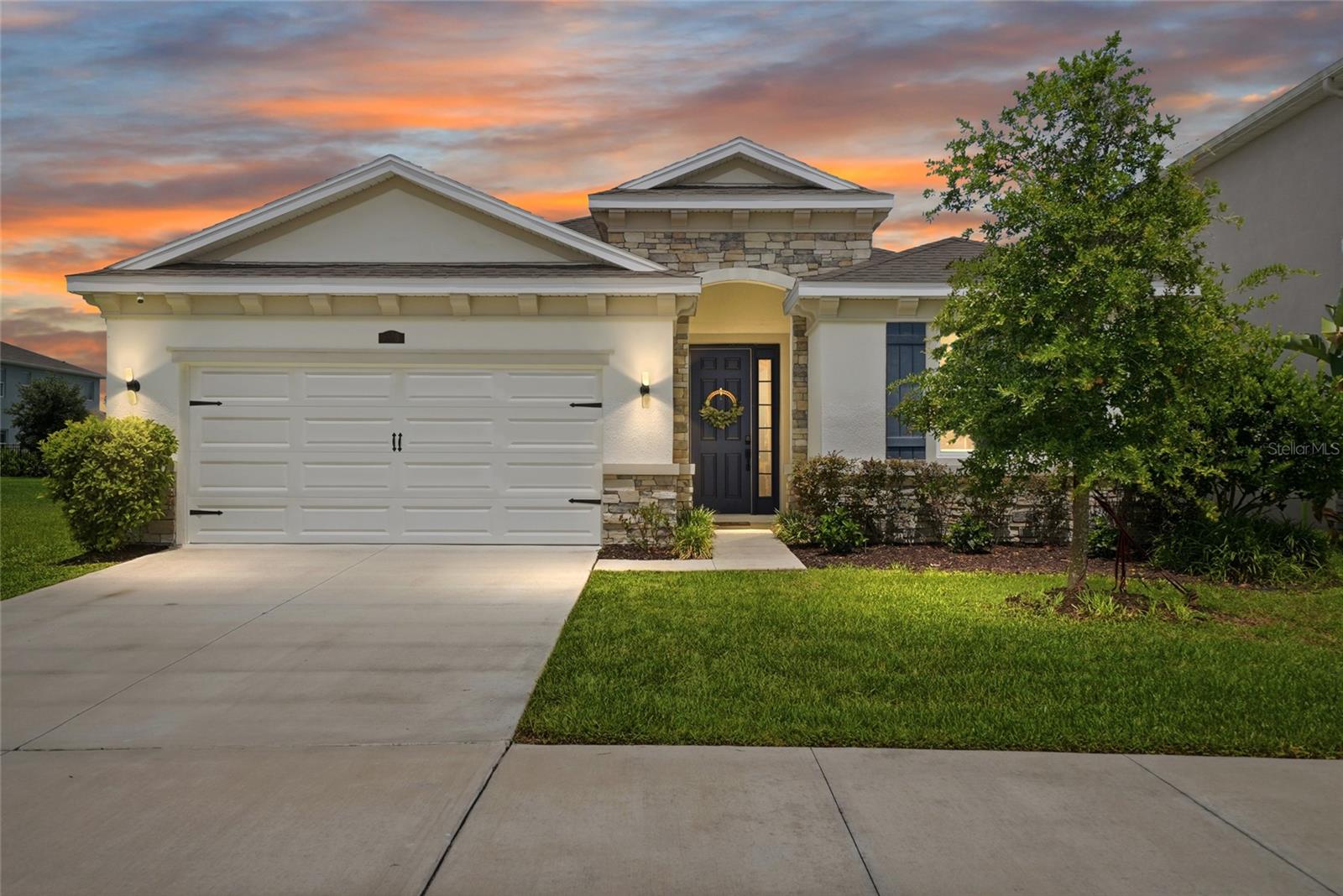 Welcome to this stunning 2021-built, one-story home with an incredible water view and no rear neighbors! This 4-bedroom, 2.5-bathroom home with a 2-car garage showcases thoughtful design and premium upgrades. The kitchen features upgraded appliances and includes a custom-built pantry with a convenient work counter. The home features Deako, Plug-n-Play lights switches, a modular switch system enabling customization without rewiring. The primary bedroom offers two walk-in closets with built-in shelving and an amazing water view. The home is fitted with versatile window treatments that open from both the top and bottom. Enjoy outdoor living with a fence and screened patio equipped with nano wiring to keep bugs and pollen out. The kitchen and bathrooms boast matching granite countertops, and all door handles and hinges have been upgraded. Preserve is a beautiful community in a highly desired area of Tampa Bay that offers its residents a relaxing lifestyle with high-end amenities, including a clubhouse, a heated pool and lap pool, tot lot, sports fields, dog park, walking trails, and scenic ponds, all while being near shopping, dining, and the area’s top schools. Schedule your showing today!