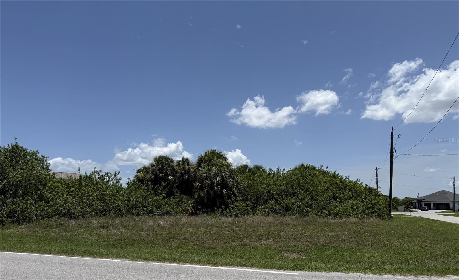 Now is a great time to invest in land or build your dream home in Southwest Florida. Great Quarter Acre Corner Lot in Rotonda Heights. Quiet and peaceful area with nice built homes