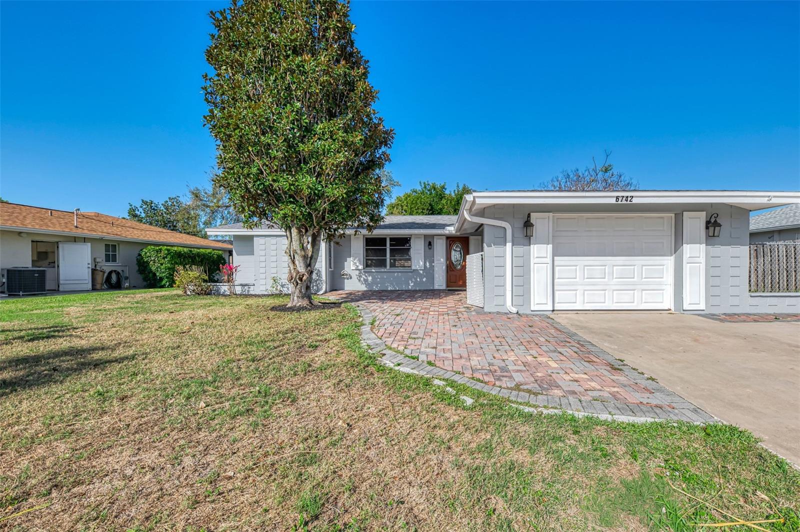 Motivated seller!  Additional price reduction of $20K!  One or more photo(s) has been virtually staged.  If you're searching for an extra-large, fully fenced backyard in a quiet and private setting, this Gulf Gate gem may be exactly what you've been waiting for in a voluntary HOA community!  This beautifully renovated home features a spacious split floor plan with two master suites, each offering large bathrooms—perfect for guests, multigenerational living, or added privacy.  Major updates provide peace of mind, including a roof that is only 4 years old, A/C just 3 years old, and a water heater replaced 4 years ago.  The home also features an updated kitchen with stainless steel appliances and stylishly updated bathroom vanities. The layout offers comfort, flexibility, and great functionality for everyday living.  Enjoy the convenience of living just minutes from the world-famous Siesta Key Beach, along with easy access to Gulf Gate shops, restaurants, and nearby malls. Excellent A-rated schools make this location even more desirable.  With its charm, valuable updates, and one of the most functional floor plans in Gulf Gate, this home offers comfort, convenience, and the best of a Florida lifestyle.  Schedule your private showing today and contact your favorite Realtor before it's gone!