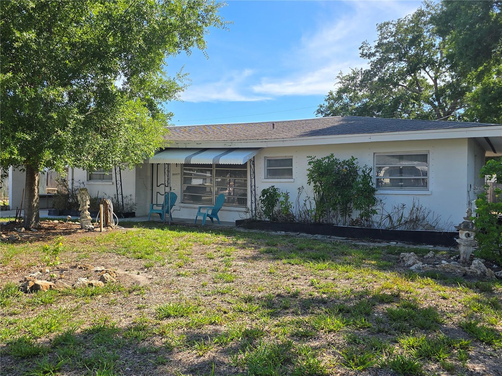 Tools and a vision are needed for this investment opportunity.  This former model classic house has mid century charm and great potential.
Living room flows into large family room with wall of windows allowing natural light in.  Don't miss the terrazzo floors adding to 
the character. Kensington Park is known for it's larger lots, has a neighborhood playground, near shopping' Ed Smith Stadium and minutes to beaches.  Price reflects current condition of the home.