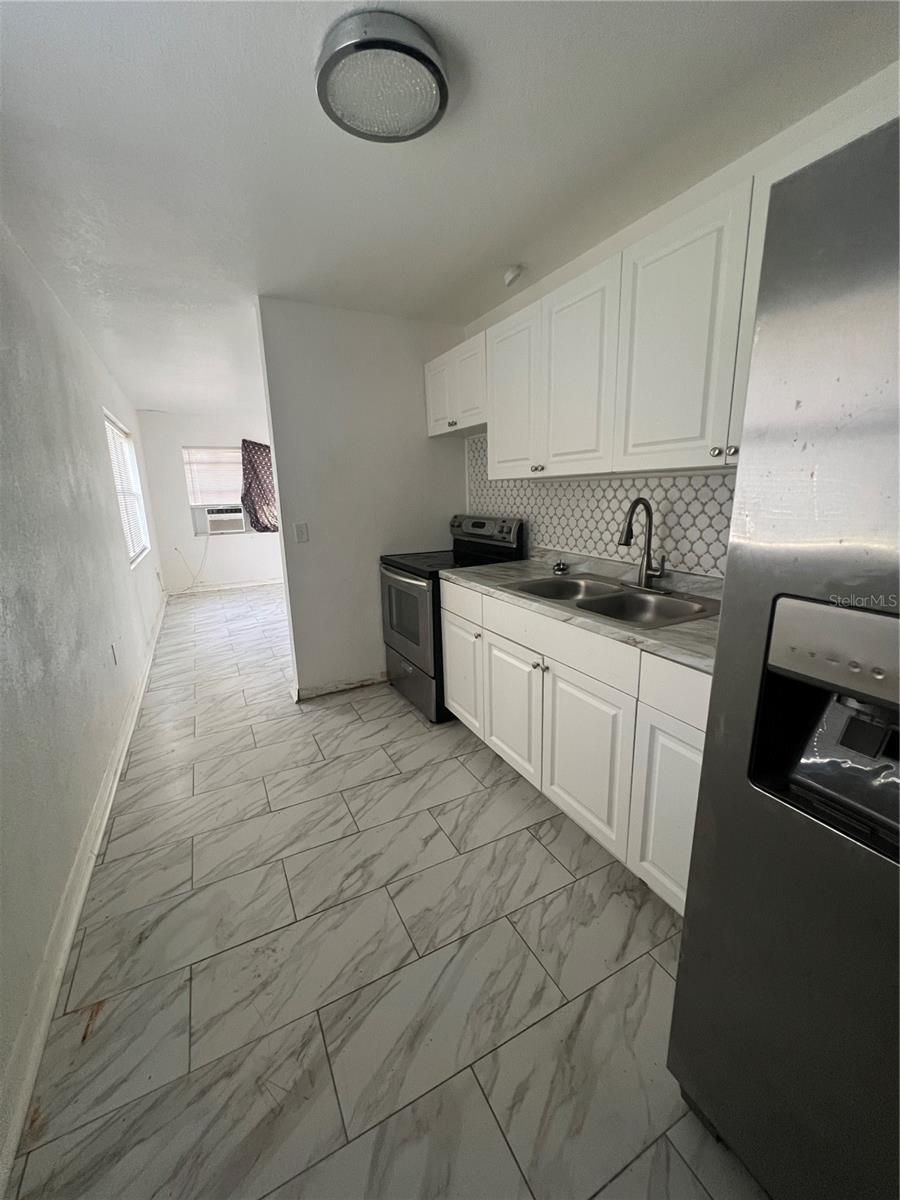 BEG 212PT7 FT S OF NW COR OF E1/2 OF SE1/4 OF NE1/ - Residential Income