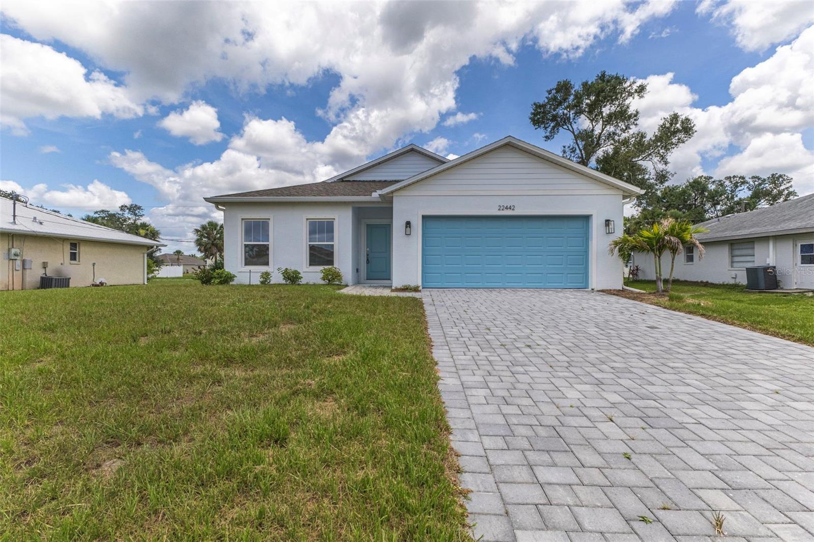 One or more photo(s) has been virtually staged. Discover this newly built 2025 single-family home in Port Charlotte, offering 4 bedrooms, 2 bathrooms, and 1,691 square feet of thoughtfully designed living space. The open and functional floor plan creates a welcoming atmosphere, ideal for both everyday living and entertaining guests.
Enjoy the convenience of an attached 2-car garage and a covered rear patio, providing the perfect space to relax and enjoy Florida's year-round sunshine. Located near shopping, dining, and other everyday conveniences, this move-in ready home combines modern finishes with a desirable location.