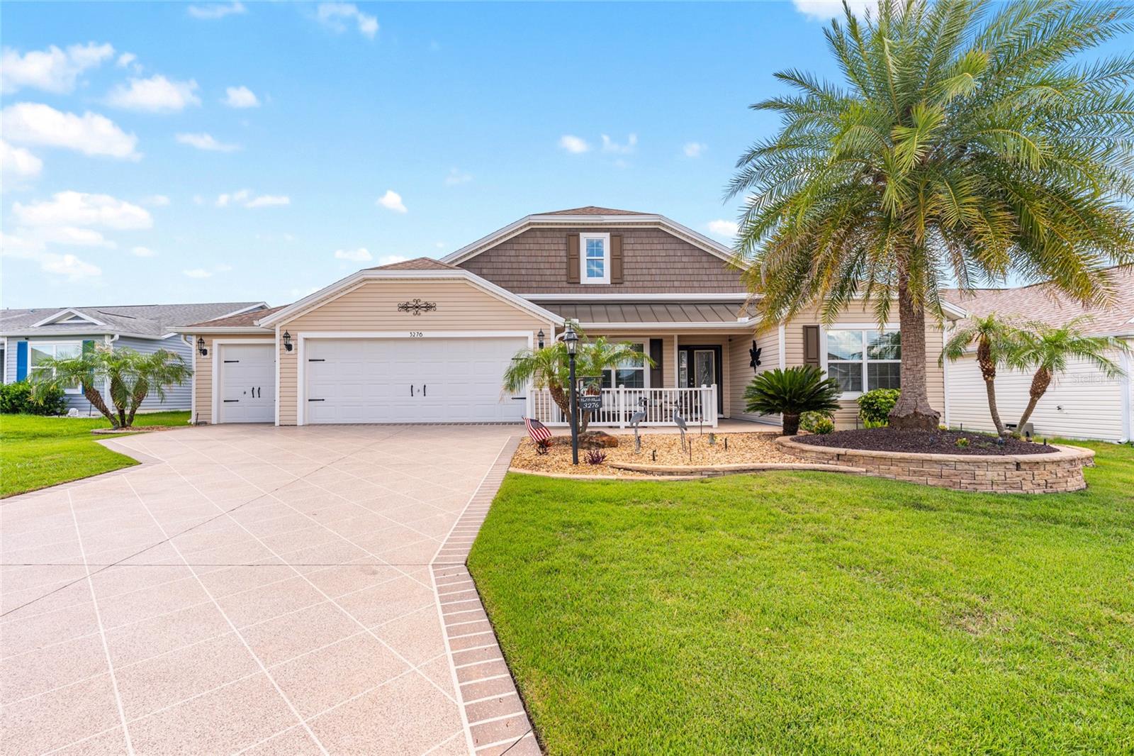 UNIQUE 4-BEDROOM PUTNAM HOME IN THE HIGHLY SOUGHT-AFTER VILLAGE OF PINE RIDGE! This beautifully upgraded home offers an OPEN-CONCEPT floor plan featuring CROWN MOLDING, WOOD CORNICES, WINDOW CASINGS, 5¼" BASEBOARDS, THREE SOLAR TUBES for added natural light, and a stunning LEADED-GLASS FRONT ENTRY DOOR. You'll appreciate the NO CARPET design, with beautiful LUXURY VINLY PLANK FLOORING THROUGHOUT the home, including 18" x 24" vinyl plank flooring in the main living areas and a second coordinating vinyl plank flooring in the remaining rooms for a seamless feel.

The upgraded kitchen is designed for both functionality and entertaining, showcasing QUARTZ COUNTERTOP OVERLAYS, BLACK STAINLESS-STEEL APPLIANCES, SOFT-CLOSE CABINETRY, TILE BACKSPLASH, PENDANT LIGHTING above the breakfast bar, and an EXTRA-LARGE DOUBLE DOOR PANTRY.

The spacious primary and guest bathrooms have both been updated with UPGRADED WALK-IN SHOWERS and GRANITE COUNTERTOPS, creating a clean, modern feel.

Outdoor living is a true highlight of this home. As you enter through FRENCH DOORS from the living room, you'll find LOW-MAINTENANCE TREX FLOORING, an EXPANDED BIRDCAGE with CAGE COVER, ROLL DOWN SHADES, a PAVER REAR PATIO, and PRIVACY LANDSCAPING perfect for relaxing or entertaining guests.  

Additional enhancements include a PAINTED DRIVEWAY, WALKWAY, and FRONT PORCH, ENHANCED LANDSCAPING with decorative CURBING, a SPIN-DOWN SPRINKLER FILTER, WATER SOFTENER and FILTRATION SYSTEM, and beautifully maintained grounds.

The OVERSIZED TWO-CAR PLUS GOLF CAR GARAGE offers durable EPOXY-COATED FLOORS and outstanding storage capabilities, highlighted by EXPANDED ATTIC STORAGE complete with PULL-DOWN STAIRS and a MOTION-SENSOR ATTIC LIGHT, making organization and access both convenient and efficient.

The spacious INTERIOR LAUNDRY ROOM is thoughtfully designed with AMPLE CABINETRY for storage and a LARGE UTILITY SINK, providing convenience for everyday living.

Ideally located in the Village of Pine Ridge, this home is positioned between two town squares and is just minutes from Moyer Recreation Center, the neighborhood pool, Belle Glade Country Club, shopping, dining, and everyday conveniences. This exceptional property combines thoughtful upgrades, abundant storage, outstanding outdoor living spaces, and a prime location to enjoy everything The Villages lifestyle has to offer.